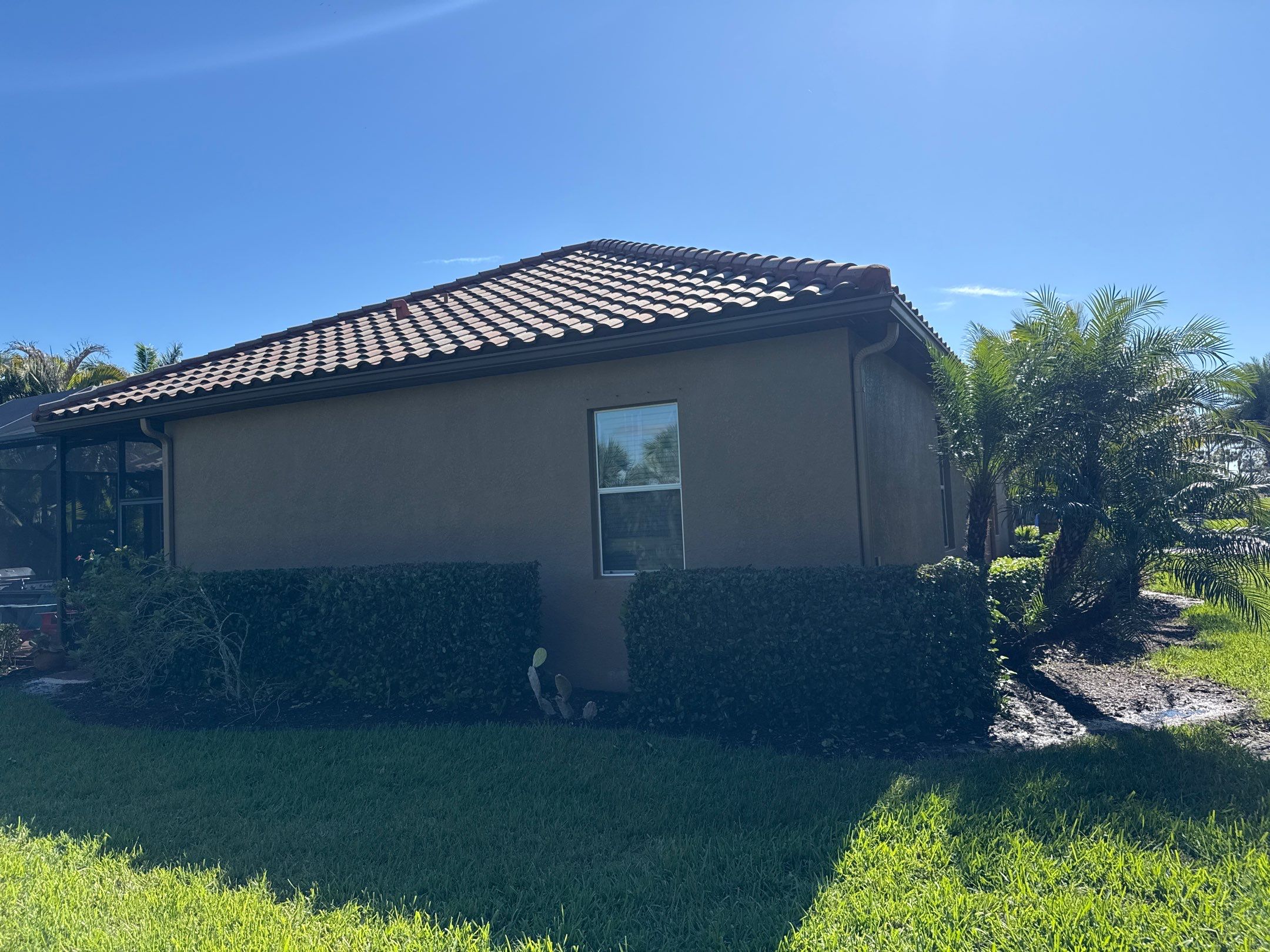 This project focused on a full gutter clean-out to restore proper water flow and prevent overflow issues.  Our scope of work included: 	•	Removing heavy leaf and pollen buildup from the gutter system 	•	Clearing out clogged sections along the rear gutters near the pool cage, where debris tends to accumulate more heavily 	•	Inspecting and cleaning the front gutter guards, which had several blocked areas restricting water flow 	•	Ensuring all downspouts and channels were flowing properly after service  Even with gutter guards installed, debris like pollen, shingle grit, and fine organic matter can still build up over time—especially in Florida’s environment. Regular maintenance helps prevent water damage, overflow, and staining on exterior surfaces.  Another thorough job completed by Sunshine AquaWash® – keeping homes protected from top to bottom. by Sunshine AquaWash