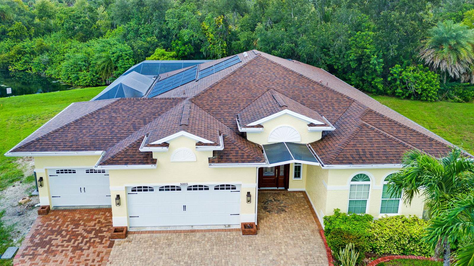 Custom Single-Car Garage Addition and Lanai Cage in Bradenton by Vertical General Contracting 