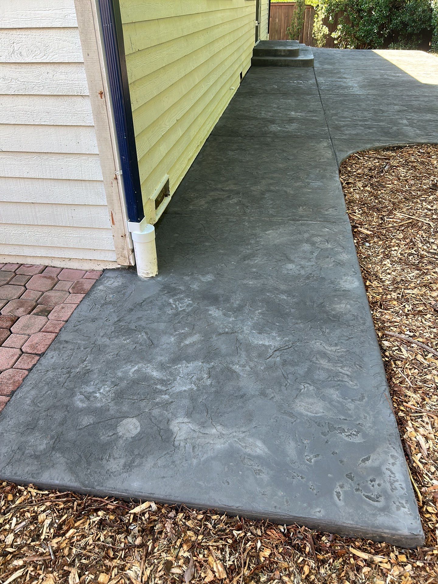 Luo | Colored Stamped Concrete Patio by Jireh Asphalt & Concrete Inc 