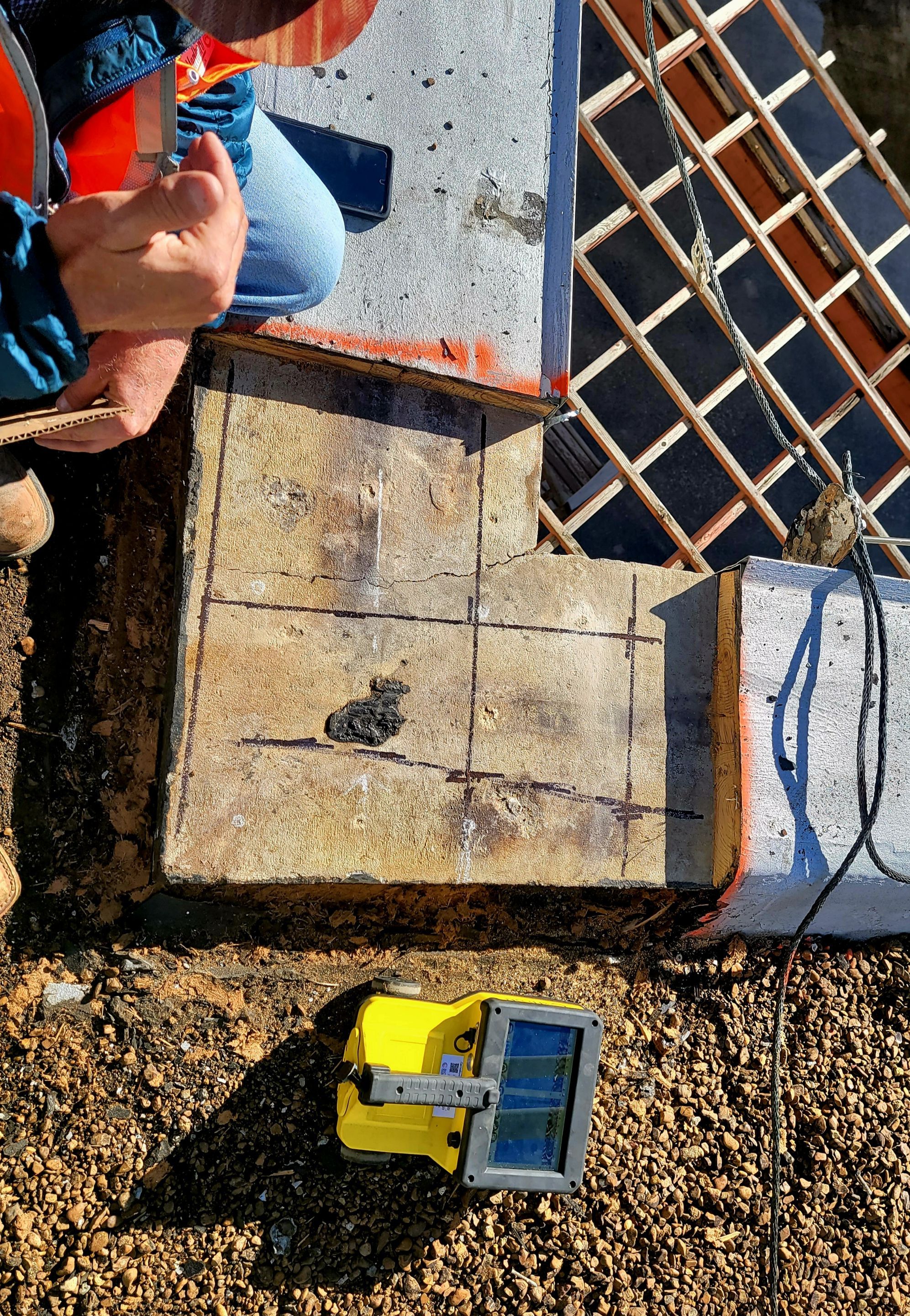 Scanning a roof section for rebar by Alsip Locating Service, LLC