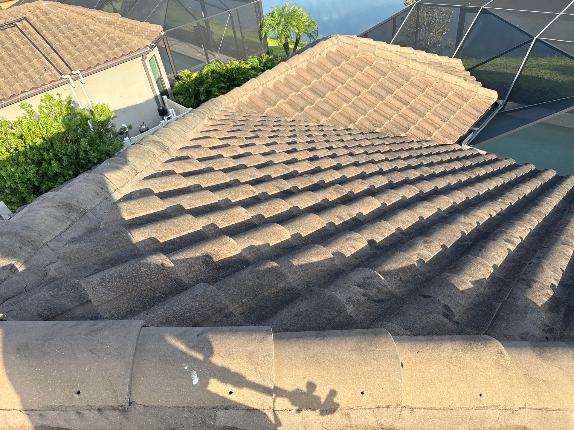 Soft Wash Roof Cleaning – Concrete Tile Roof | Artisan Lakes Esplanade, Palmetto, FL by Sunshine AquaWash