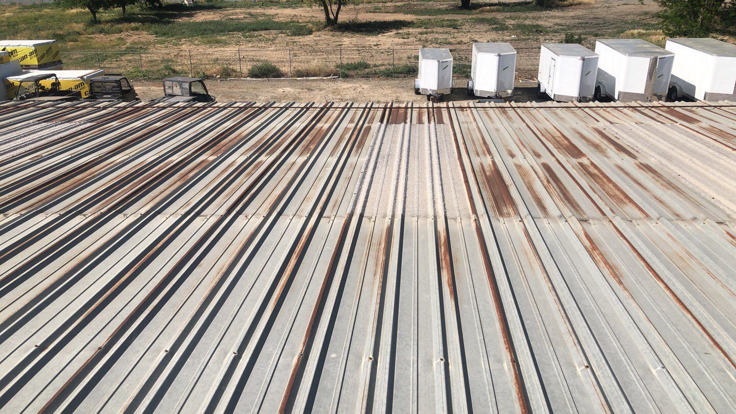 Metal Restoration Roofing system with Benchmark/PUMA XL 20 yr warranty by Straight Edge Roofing Inc