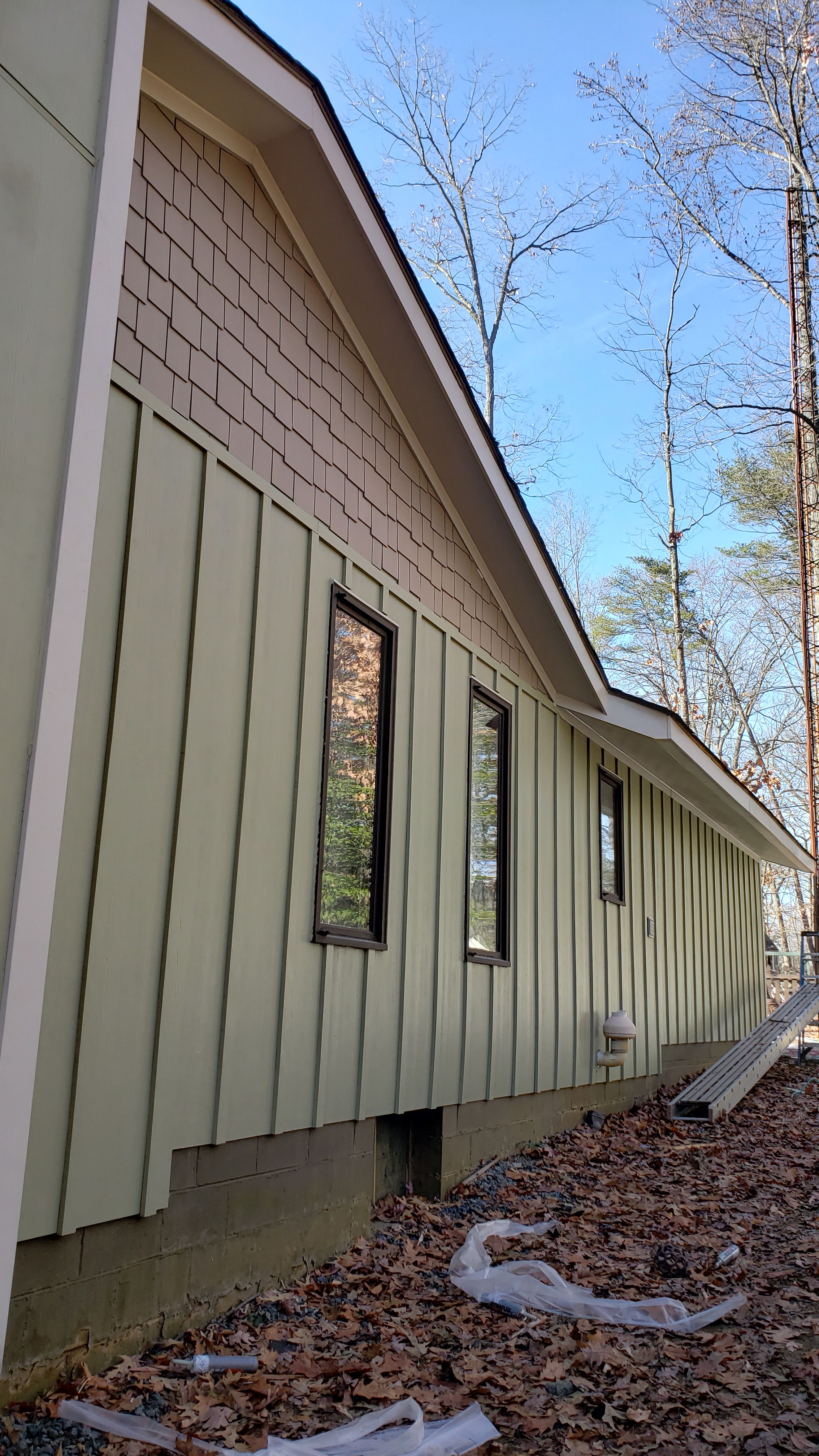 Siding Replacement by American Home Contractors