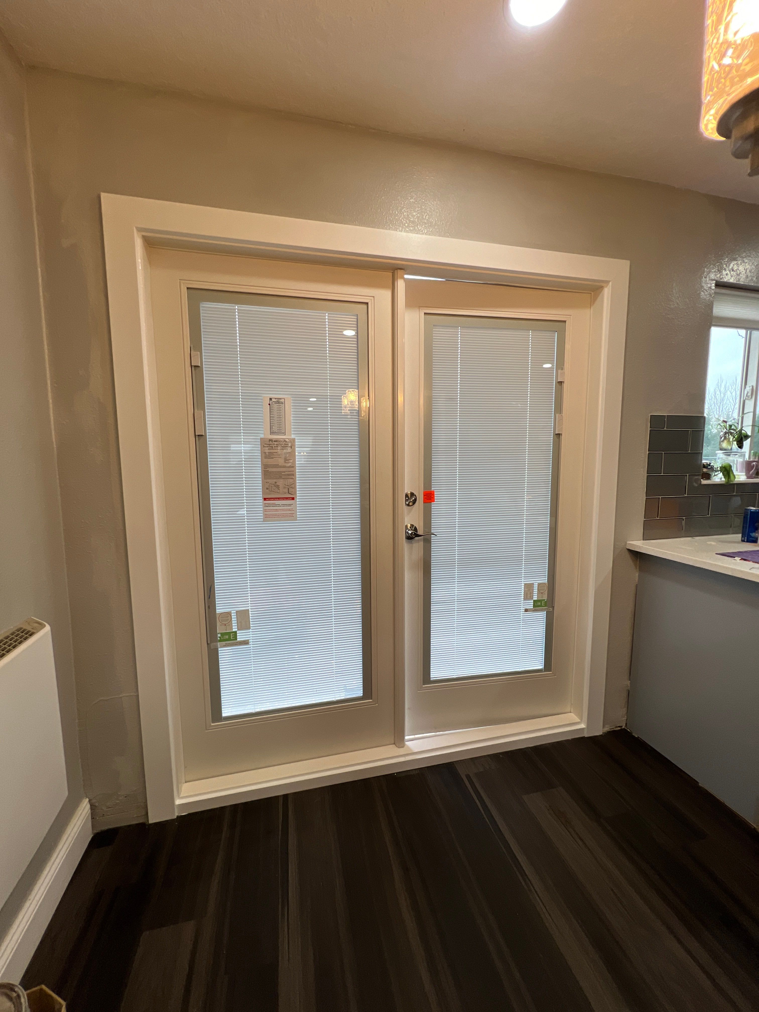 Door Installation using French Door by Villegas Remodeling, LLC
