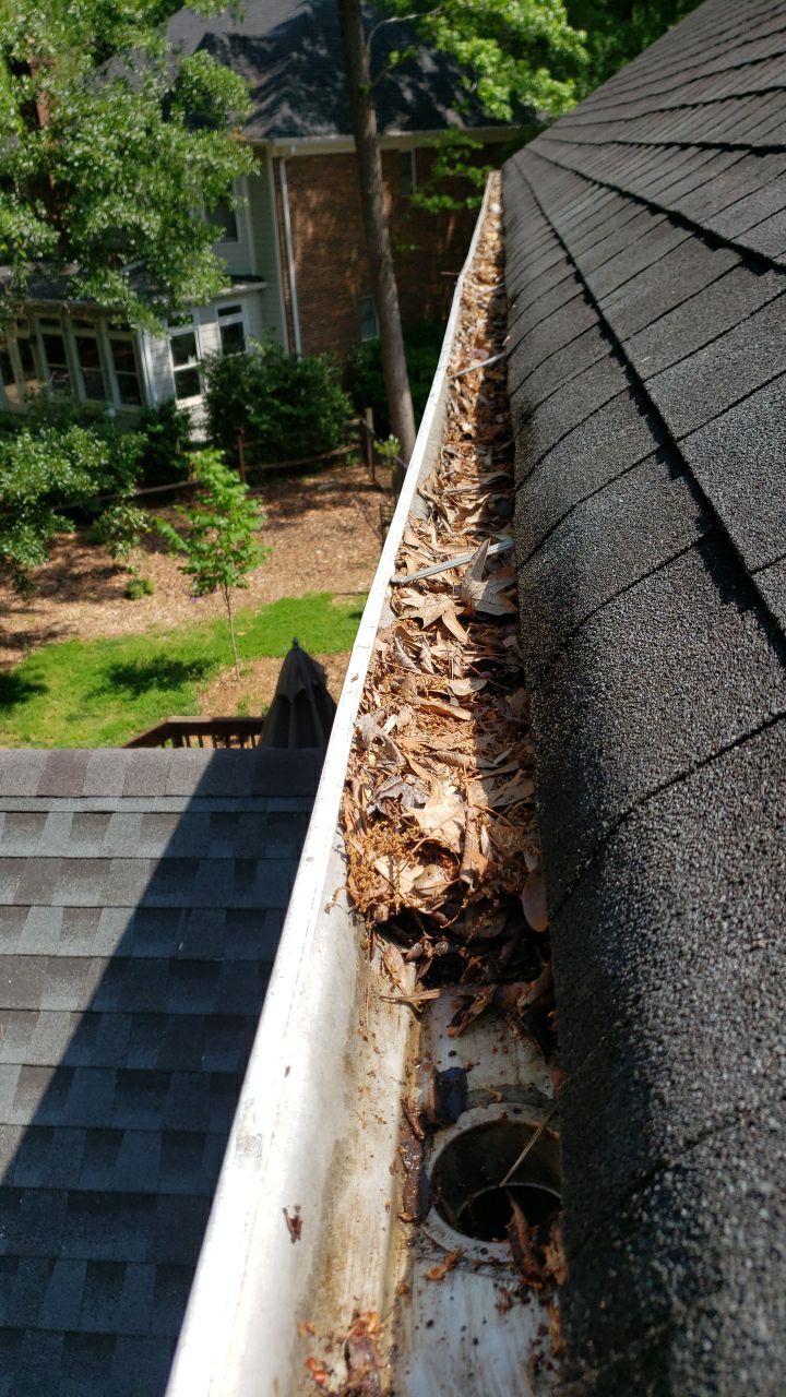 Gutter Cleaning using water by Power Wash Masters LLC