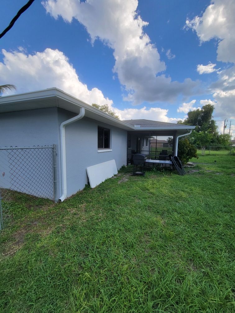 New Gutter System with Splash Guards in Cape Coral FL by Gutter Professors