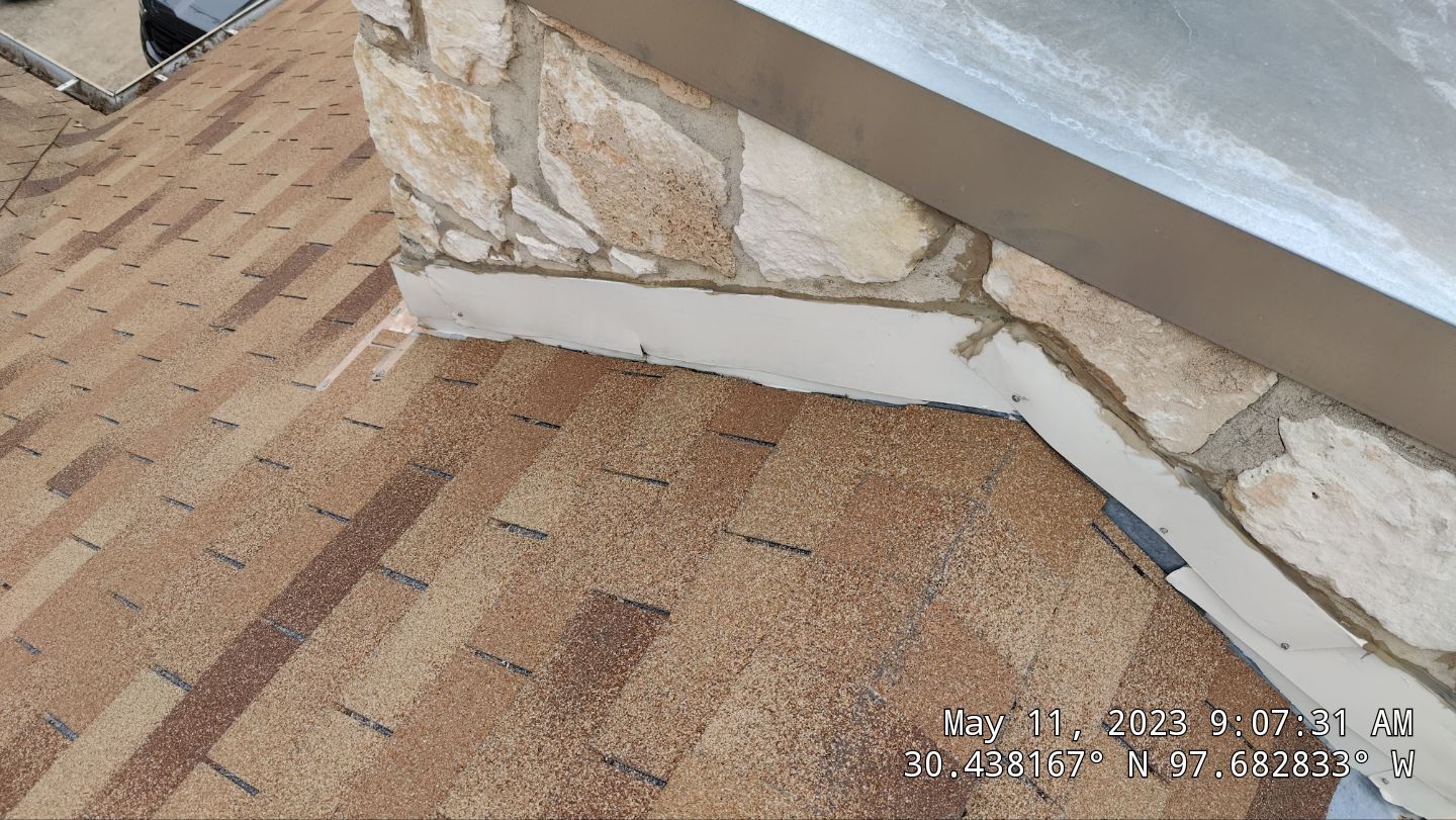 New Roof Installation Of IKO Dynasty Color Brownstone by DeZign Roofing & Exteriors