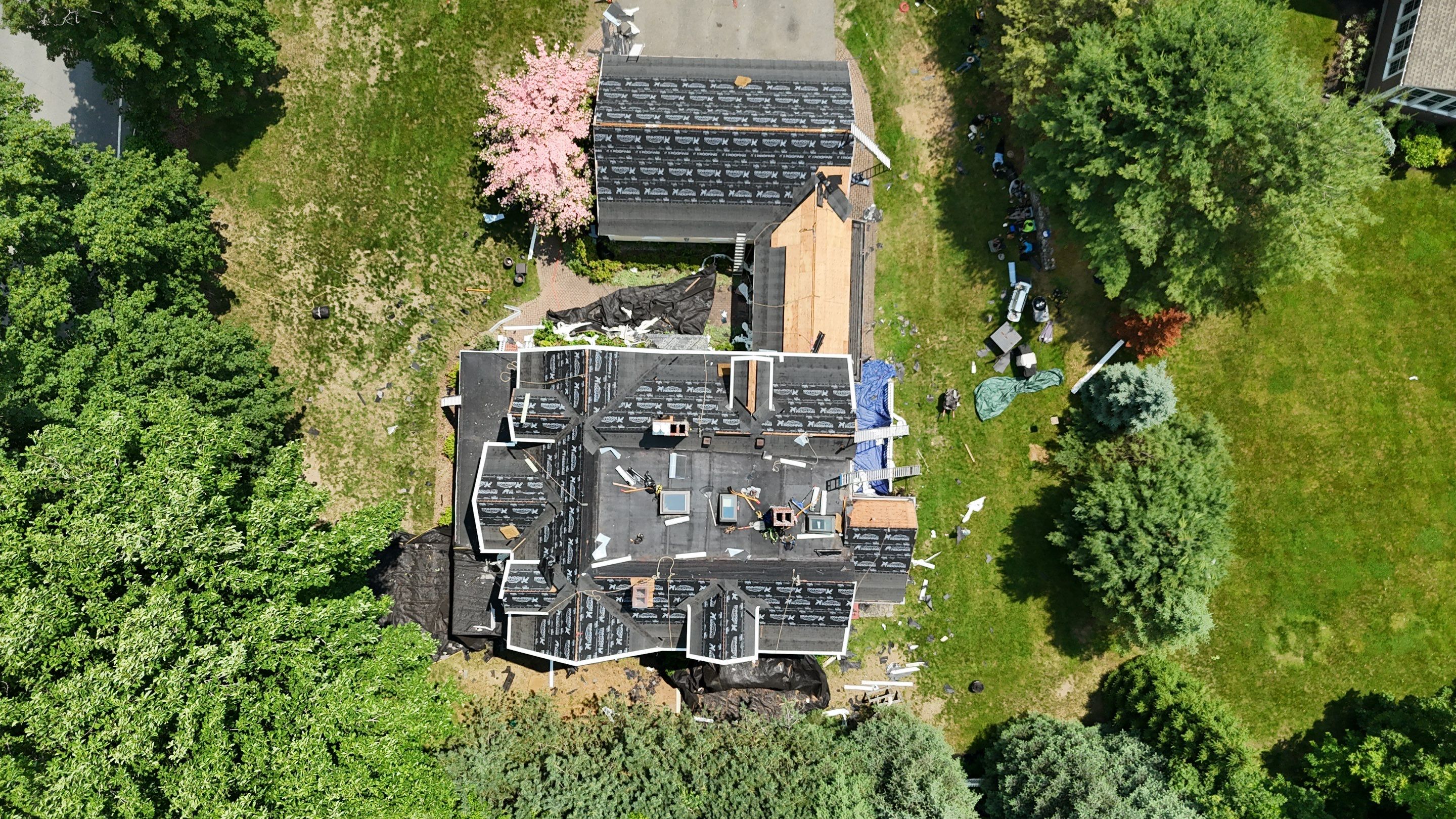 Full Roof Replacement & EPDM Restoration – North Andover, MA by Mighty Dog Roofing of Greater Middlesex County