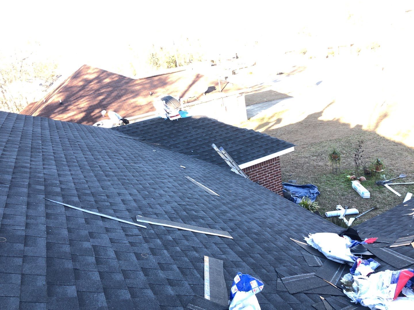 Residential Roofing Installation using Roof Replacement by American Roofing & Construction LLC