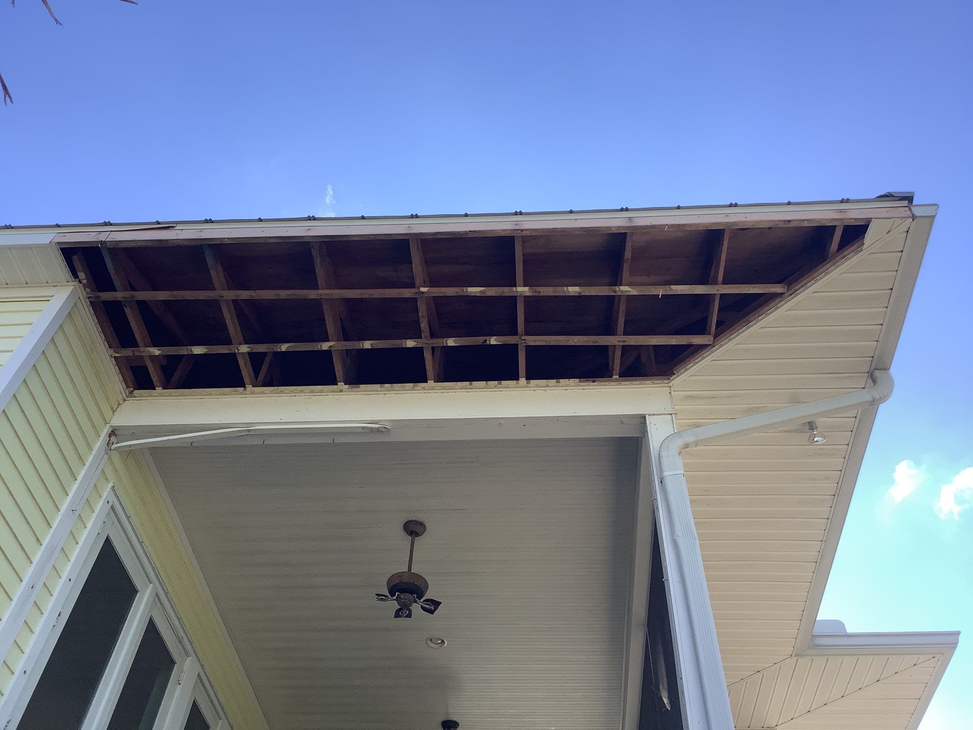 White Gutters with Matching Downspouts in Sarasota FL by Gutter Professors
