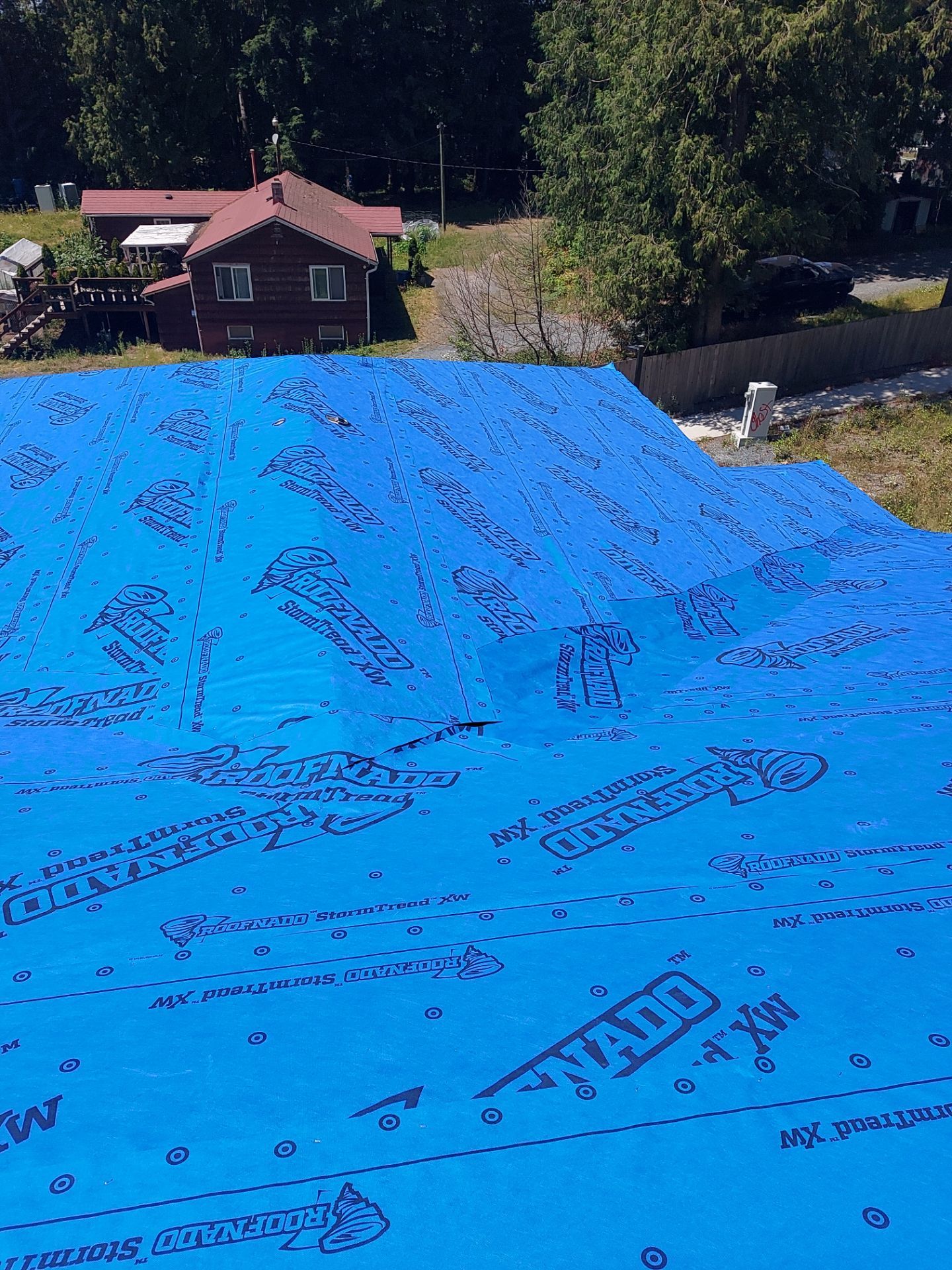 Residential Roofing Installation by Top Notch Roofing Inc
