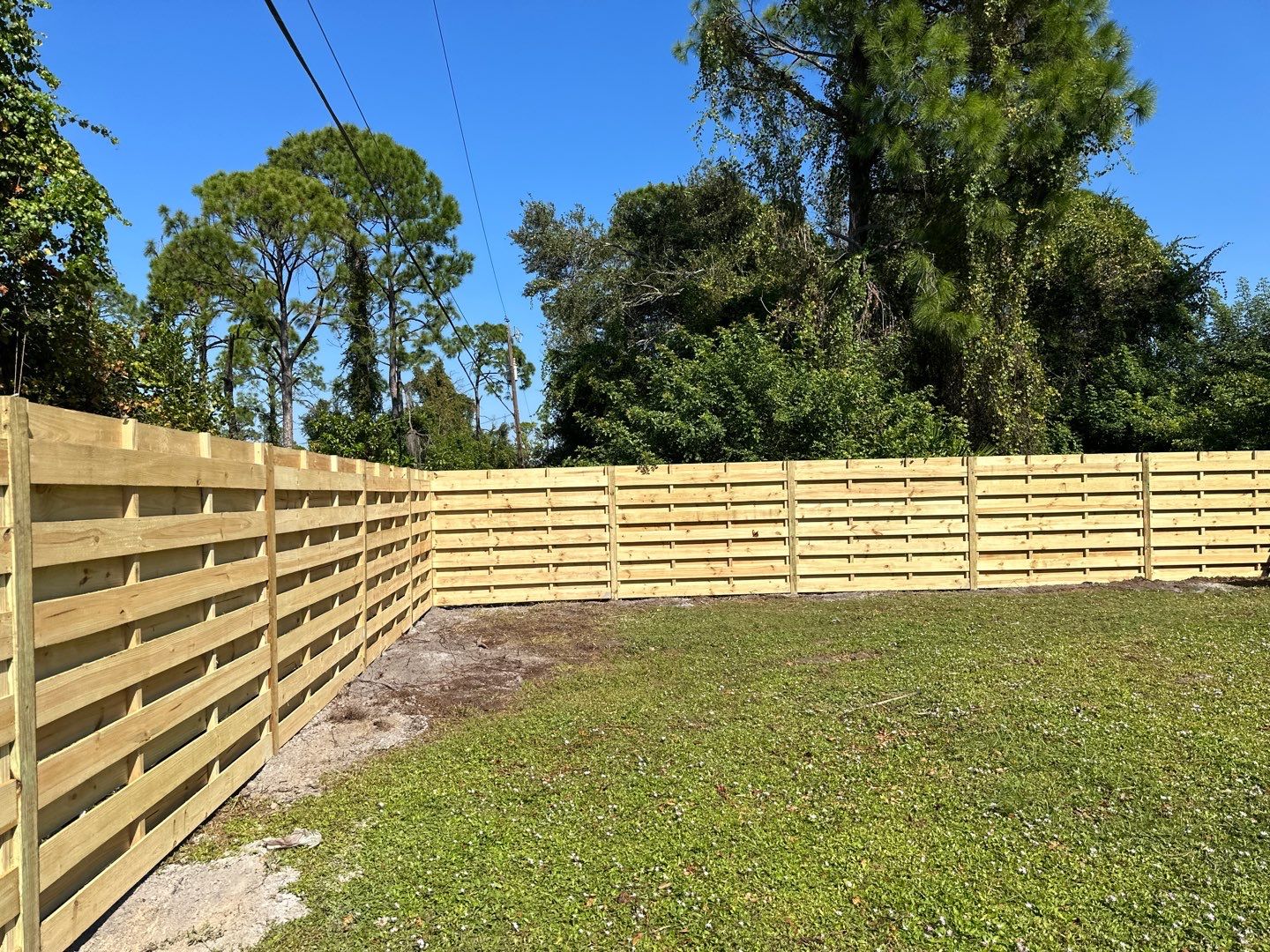 Wood Fence Installation using 6 Ft. Tall Pressure Treated Wood Shadowbox Fence by Asap fence and gates, LLC