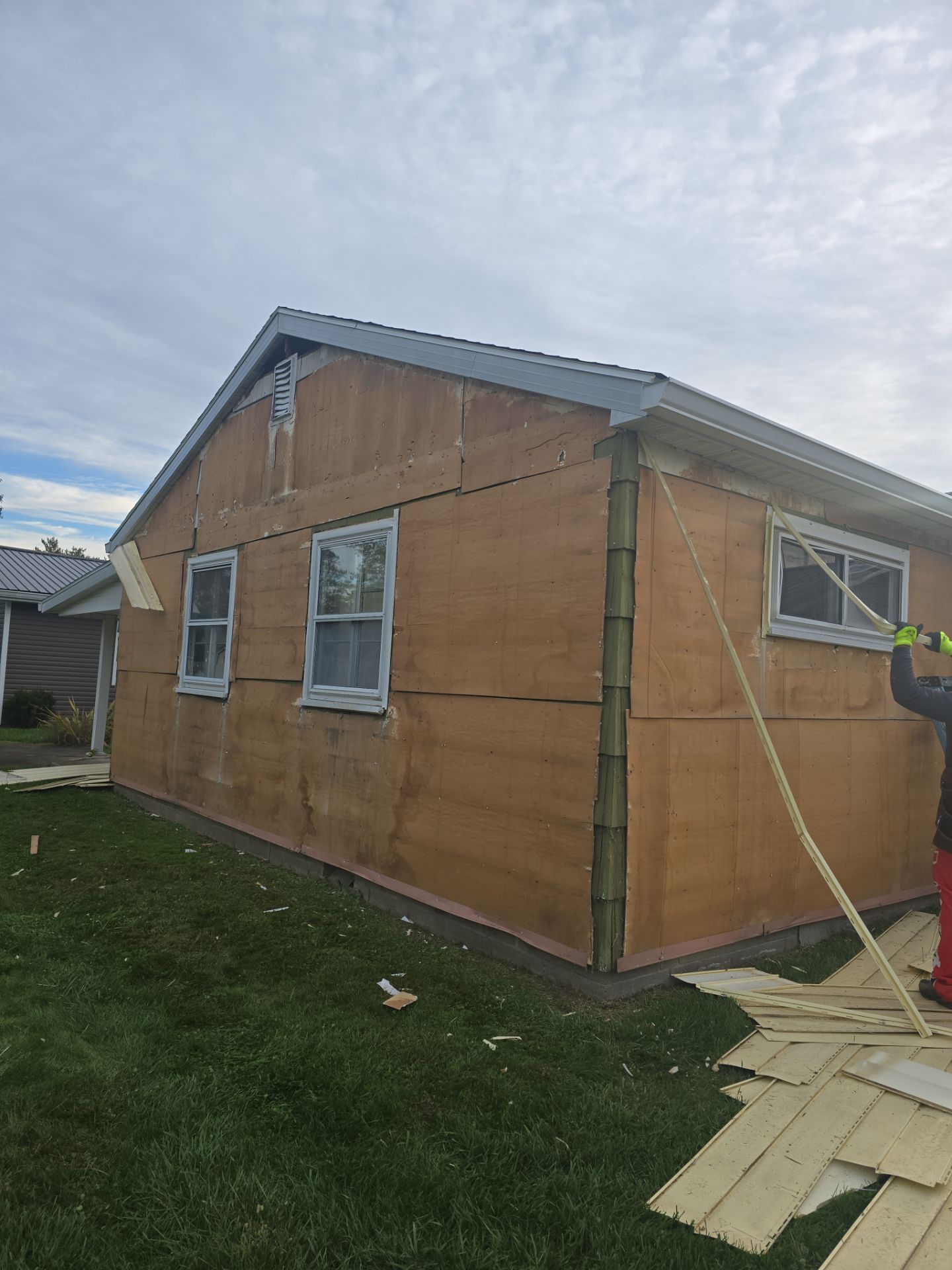Siding Installation using Vinyl Siding by Rainstoppers Roofing