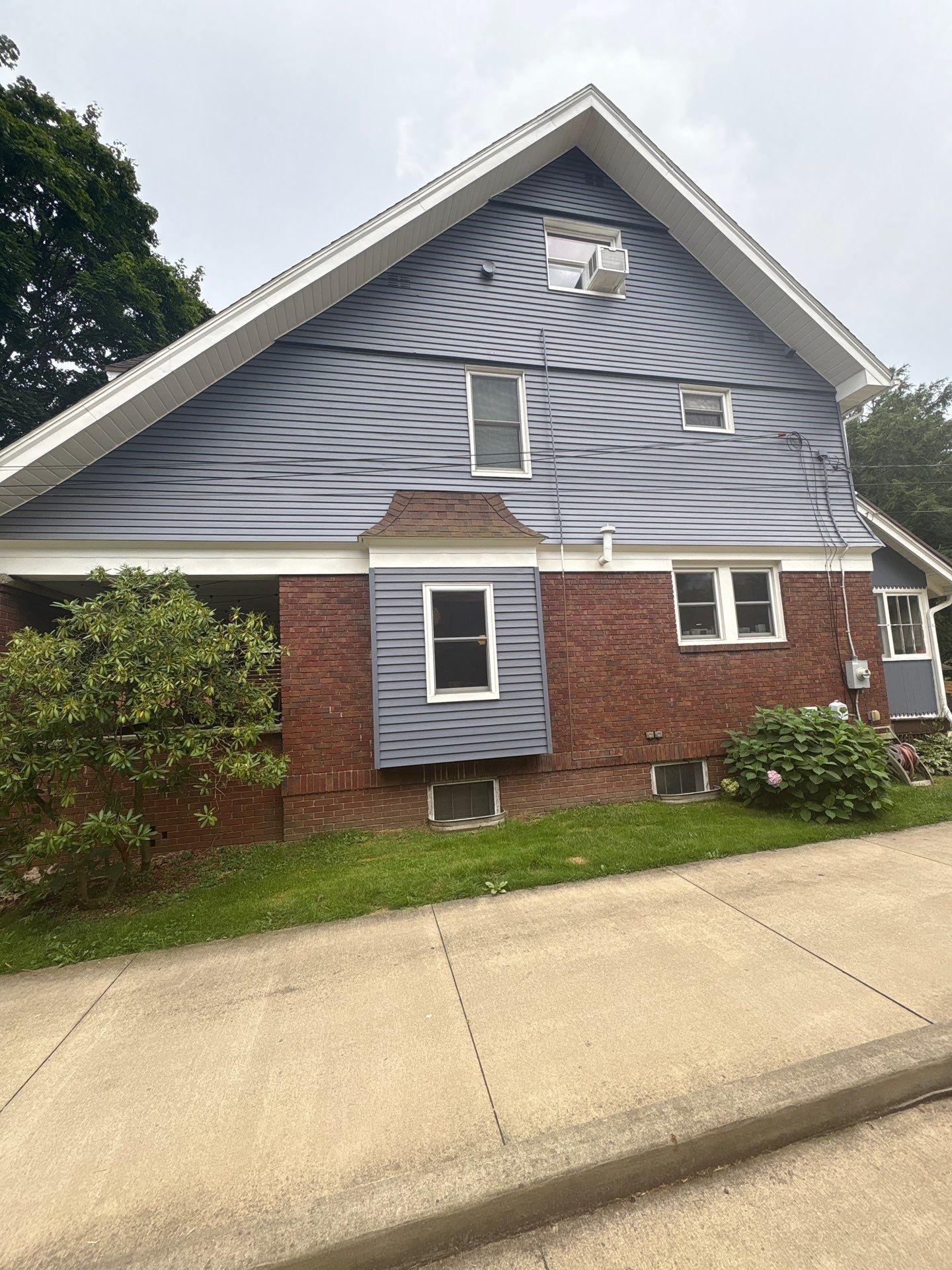 The Ultimate Wooster Makeover: Brownwood & Blue Beauty by Cornerstone Roofing And Siding