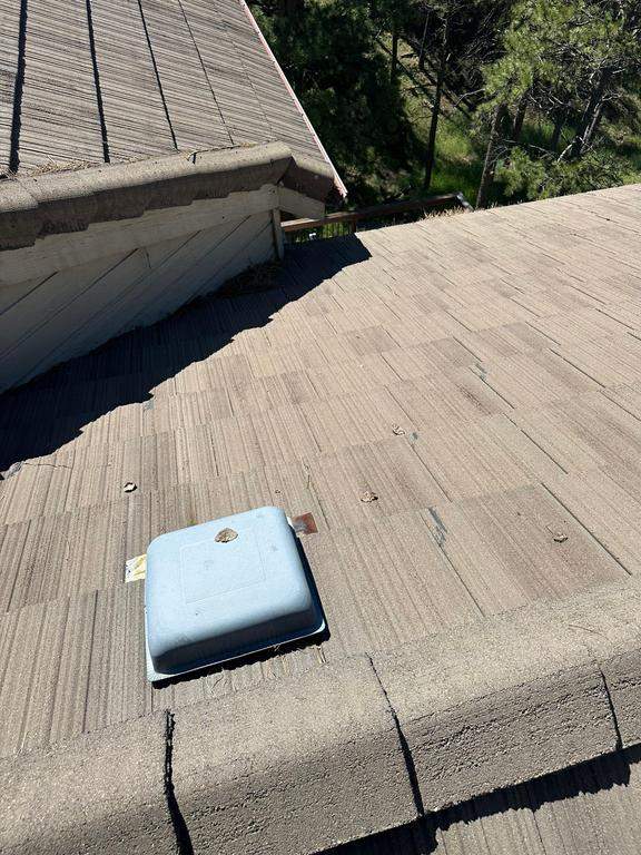 Residential Roofing Installation using Concrete Tile by Blue Peaks Roofing LLC 