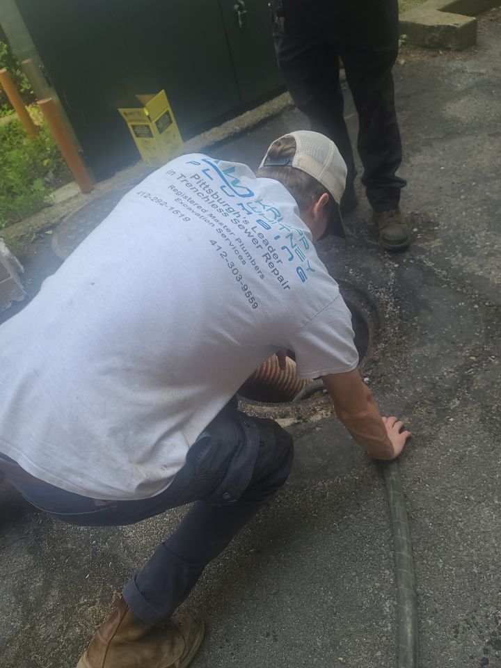 Sewer Repair using Perma-Liner through two manholes by Sureway Comfort John Wilcox Plumbing Heating Cooling