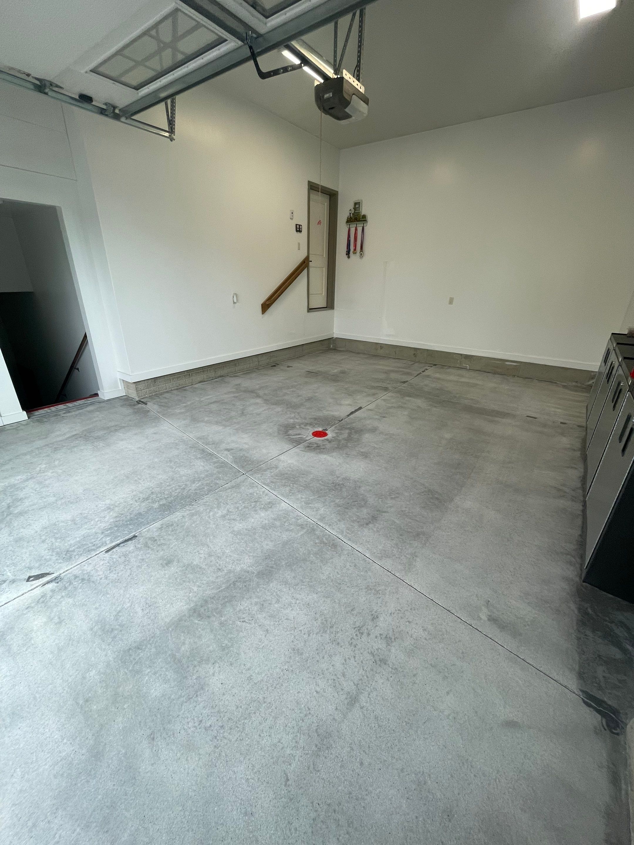 Garage Floor Coating and Domino Flake Finish in Sioux Falls by Select Painting, Coatings & Garage Cabinets