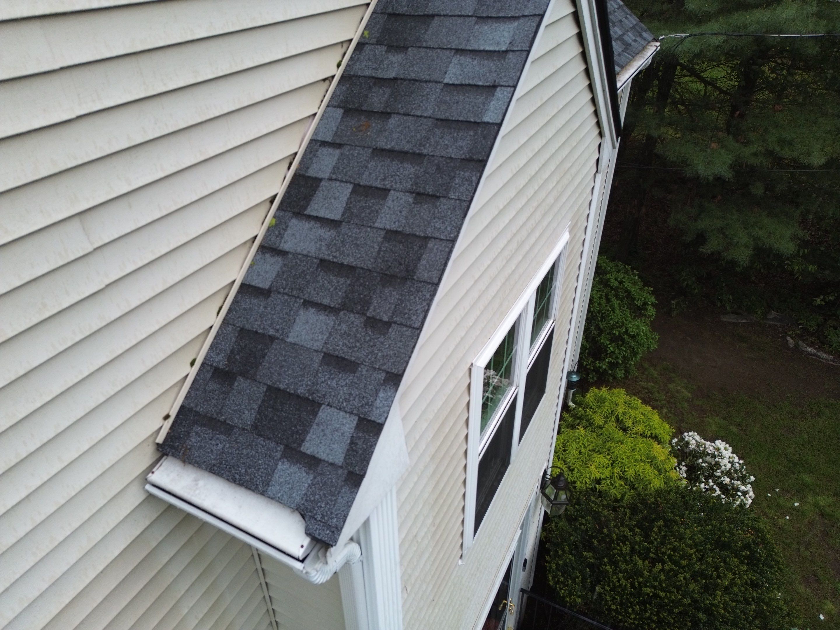 Leak Repair & Gutter Replacement in Chelmsford, MA by Mighty Dog Roofing of Greater Middlesex County
