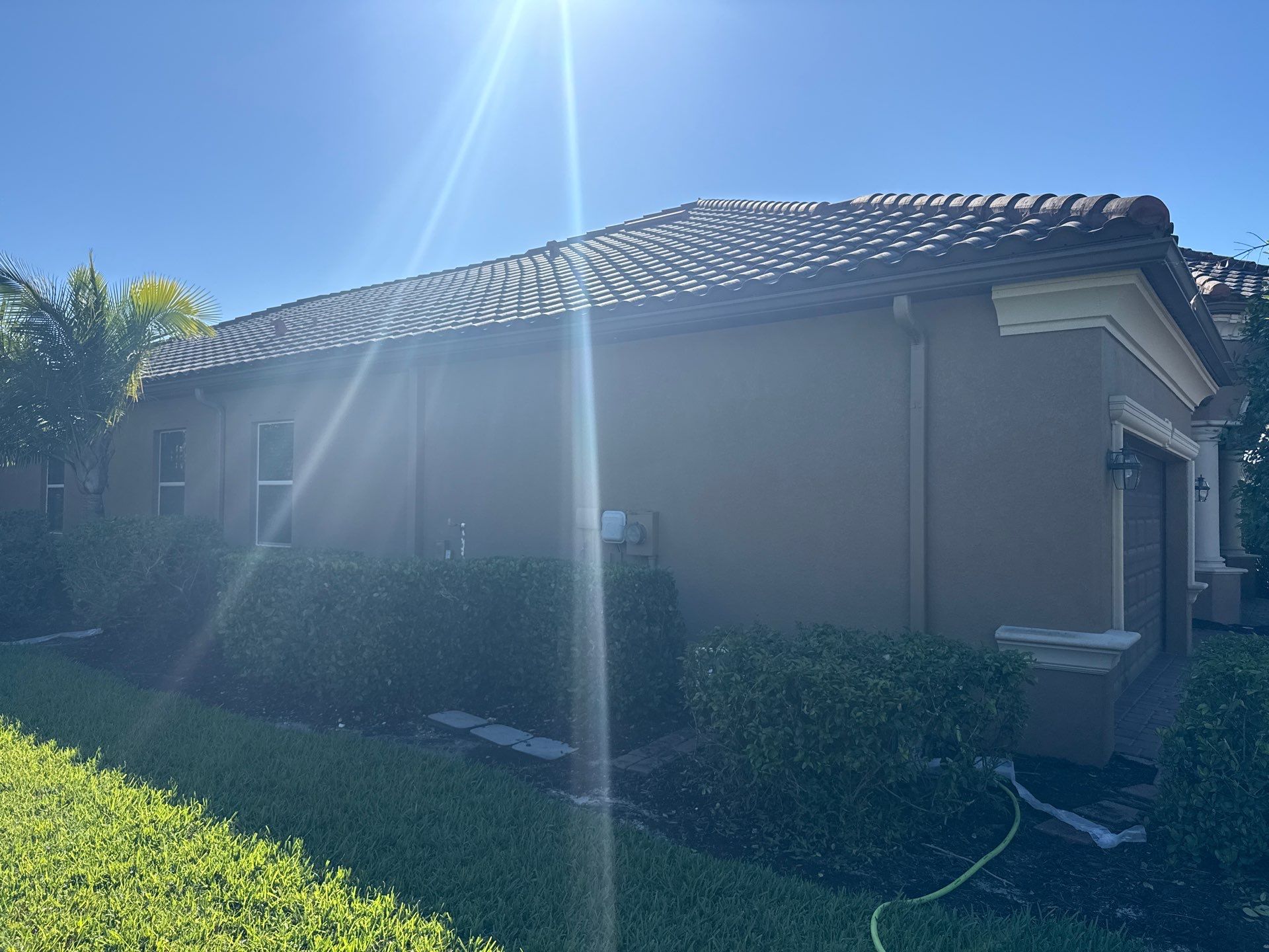 This project focused on a full gutter clean-out to restore proper water flow and prevent overflow issues.  Our scope of work included: 	•	Removing heavy leaf and pollen buildup from the gutter system 	•	Clearing out clogged sections along the rear gutters near the pool cage, where debris tends to accumulate more heavily 	•	Inspecting and cleaning the front gutter guards, which had several blocked areas restricting water flow 	•	Ensuring all downspouts and channels were flowing properly after service  Even with gutter guards installed, debris like pollen, shingle grit, and fine organic matter can still build up over time—especially in Florida’s environment. Regular maintenance helps prevent water damage, overflow, and staining on exterior surfaces.  Another thorough job completed by Sunshine AquaWash® – keeping homes protected from top to bottom. by Sunshine AquaWash