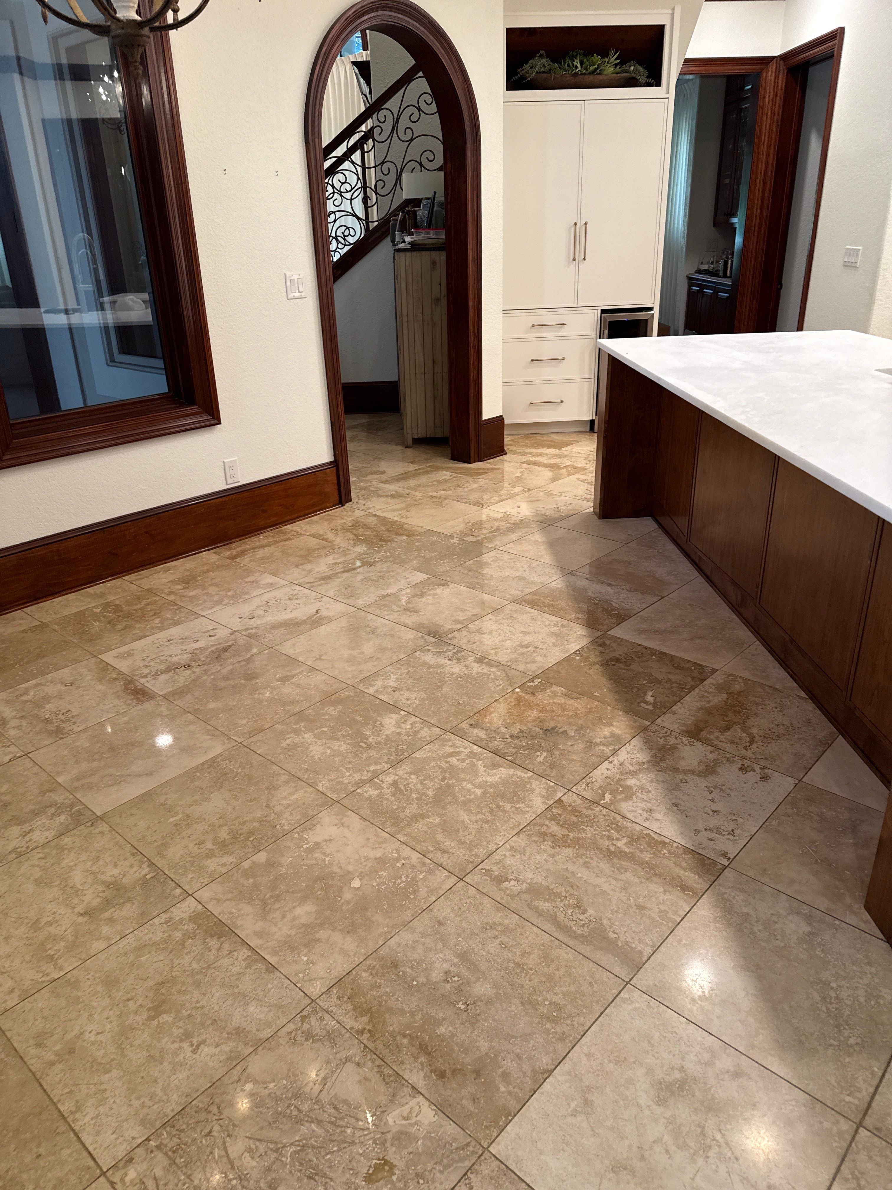 Polished Travertine Floor Restoration for Gulf Shores Residence by Cornerstone Hard Surface Restoration