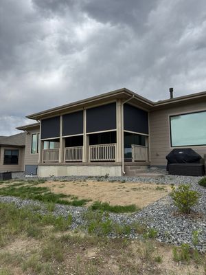 Exterior MagnaTrack Solar Screen Installation on Castle Rock Covered Patio