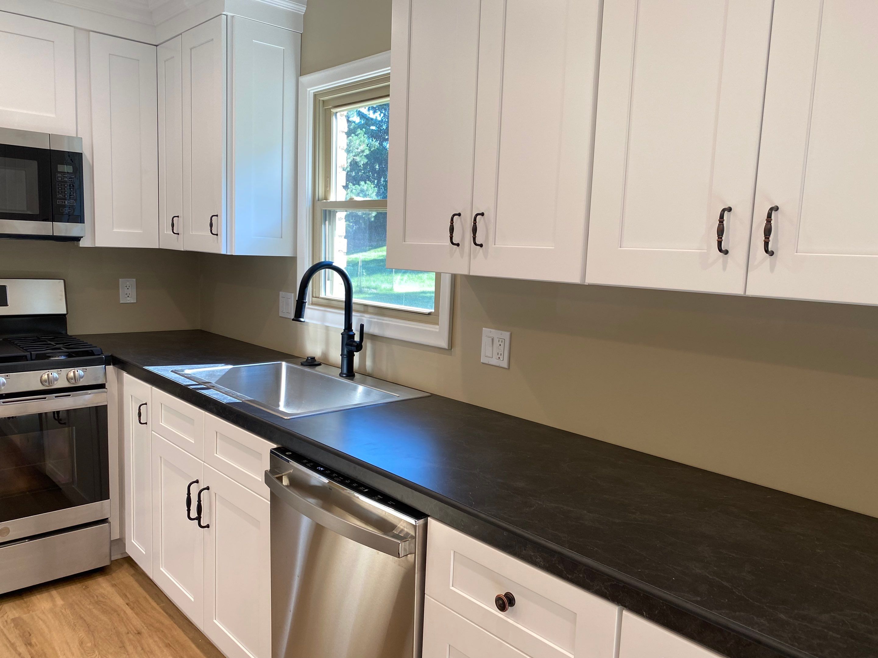 Kitchen Remodel using IMAGIO Arabesque Drops Solid Glass Backsplash by IMAGIO