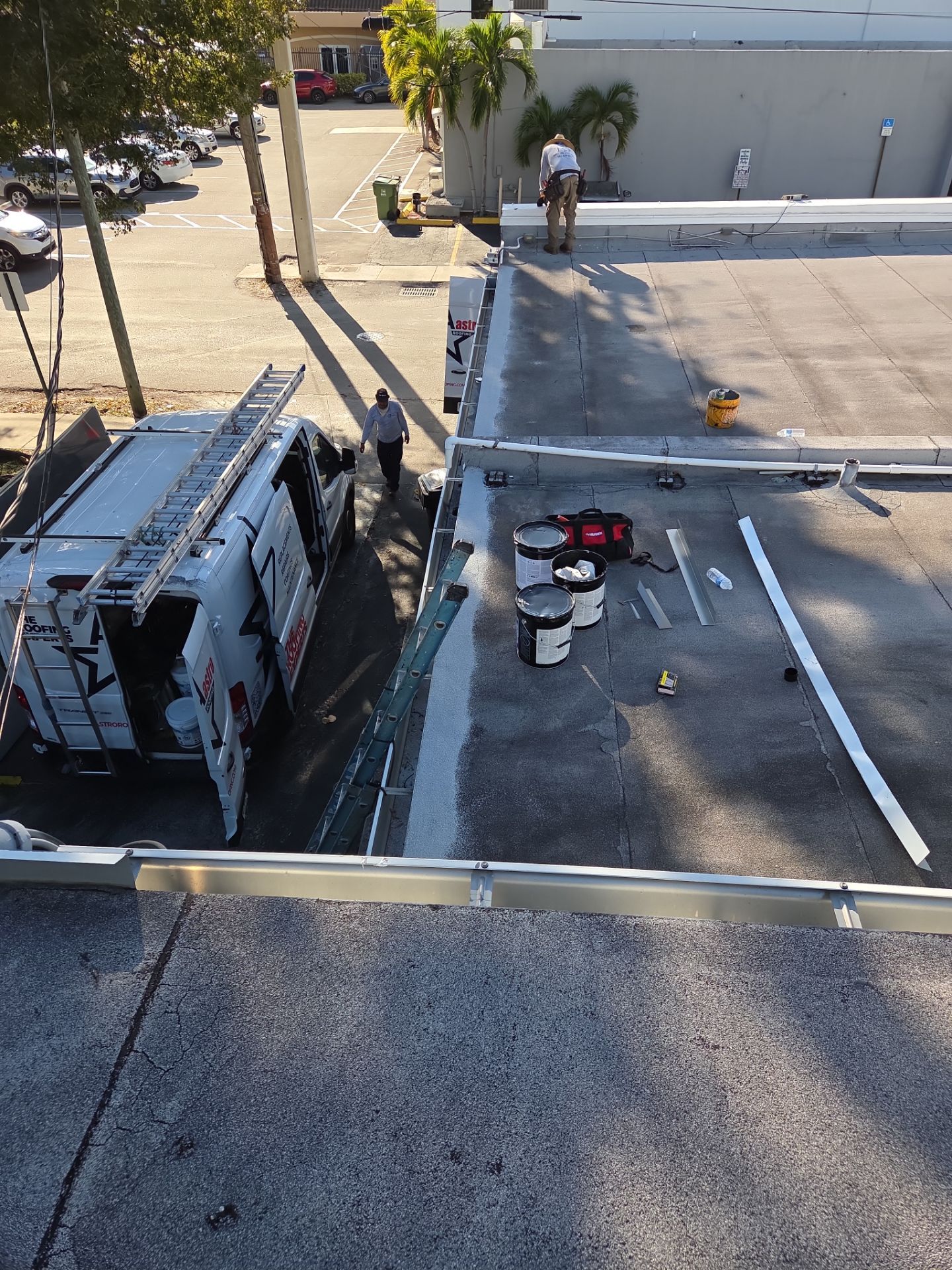 Commercial Flat Roof Restoration Using Silicone Coating in Hallandale Beach by Aastro Roofing