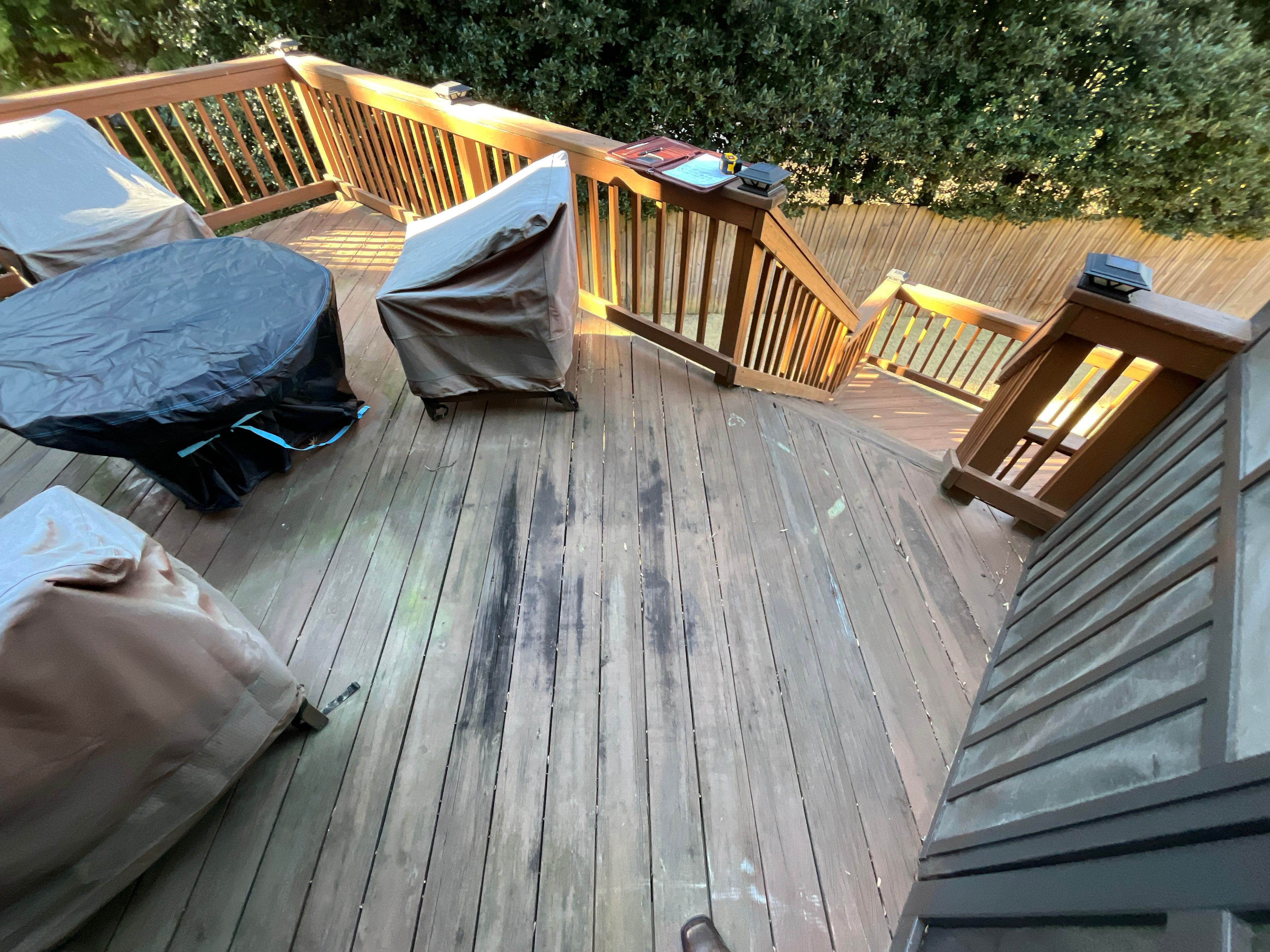 Deck and Fence Stain with Deck Board Repairs in Atlanta, GA by Nelson Exteriors 