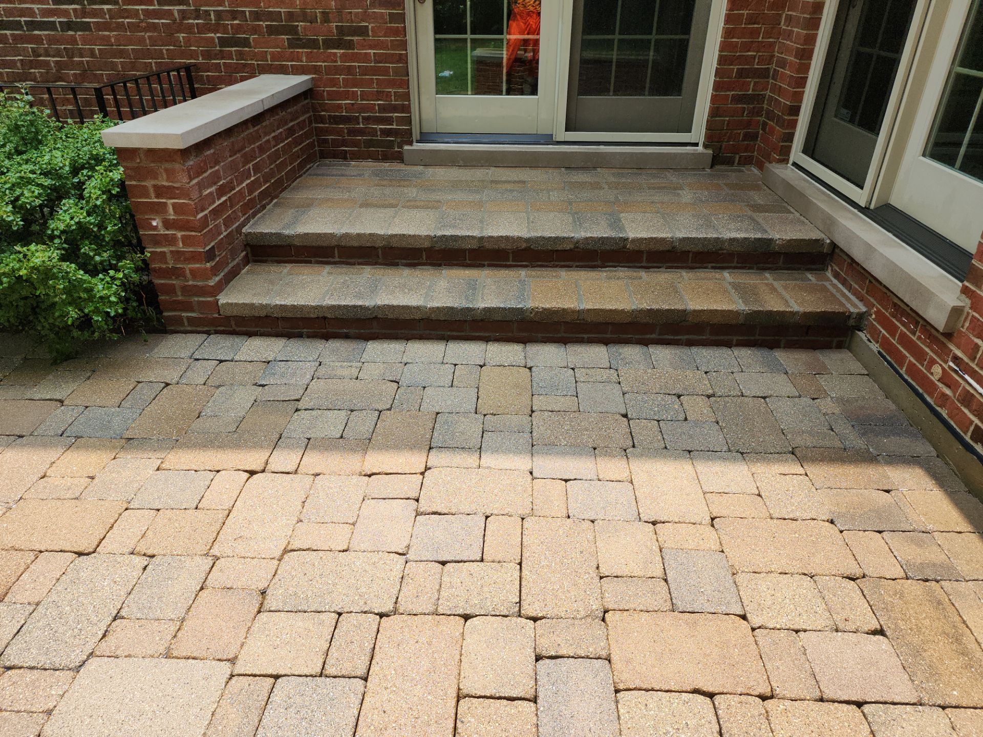 Brick paver repair, clean, seal and poly sanding by Northern Power Washing LLC.