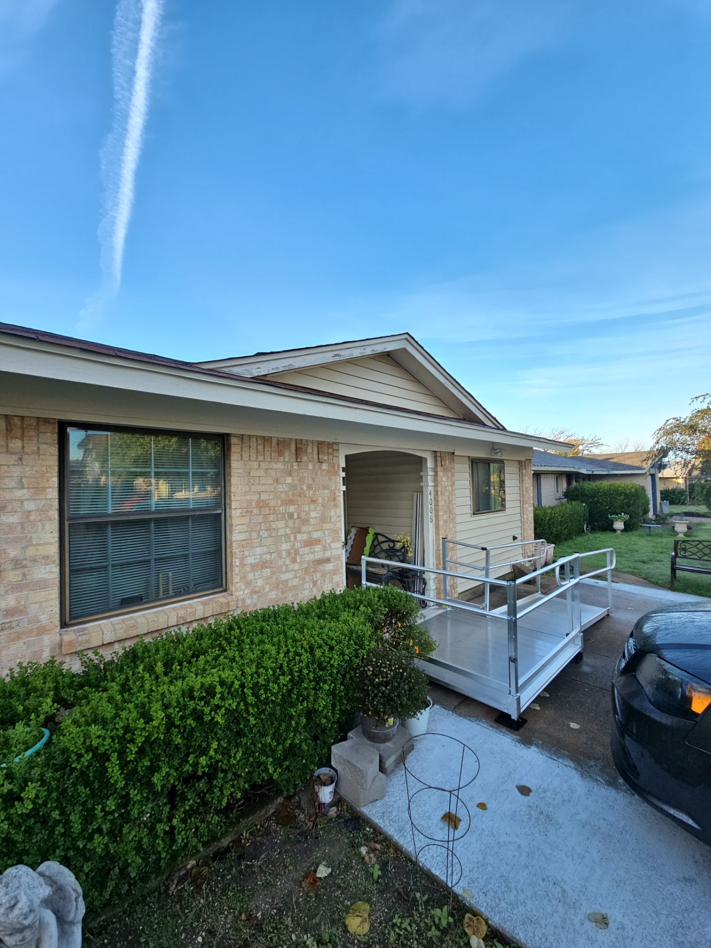 Complete Exterior Renovation: Roof, Custom Porches & Concrete Patio in Garland, TX by road roofing llc