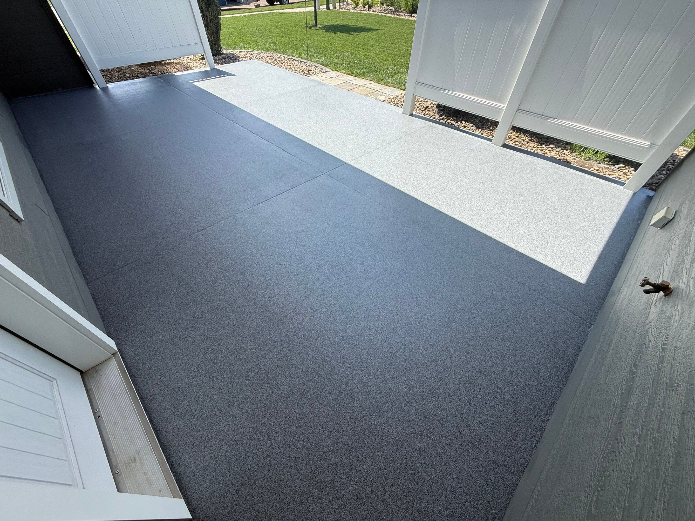 Polyurea Patio Floor Coating in Starry Evening for Sioux Falls Home by Select Painting, Coatings & Garage Cabinets