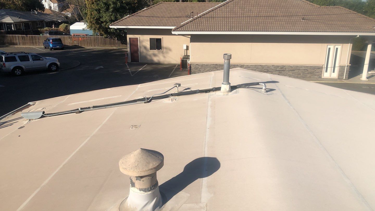 Spray foam and coatings using Conklin Benchmark/PUMA XL coatings and spray foam by Straight Edge Roofing Inc