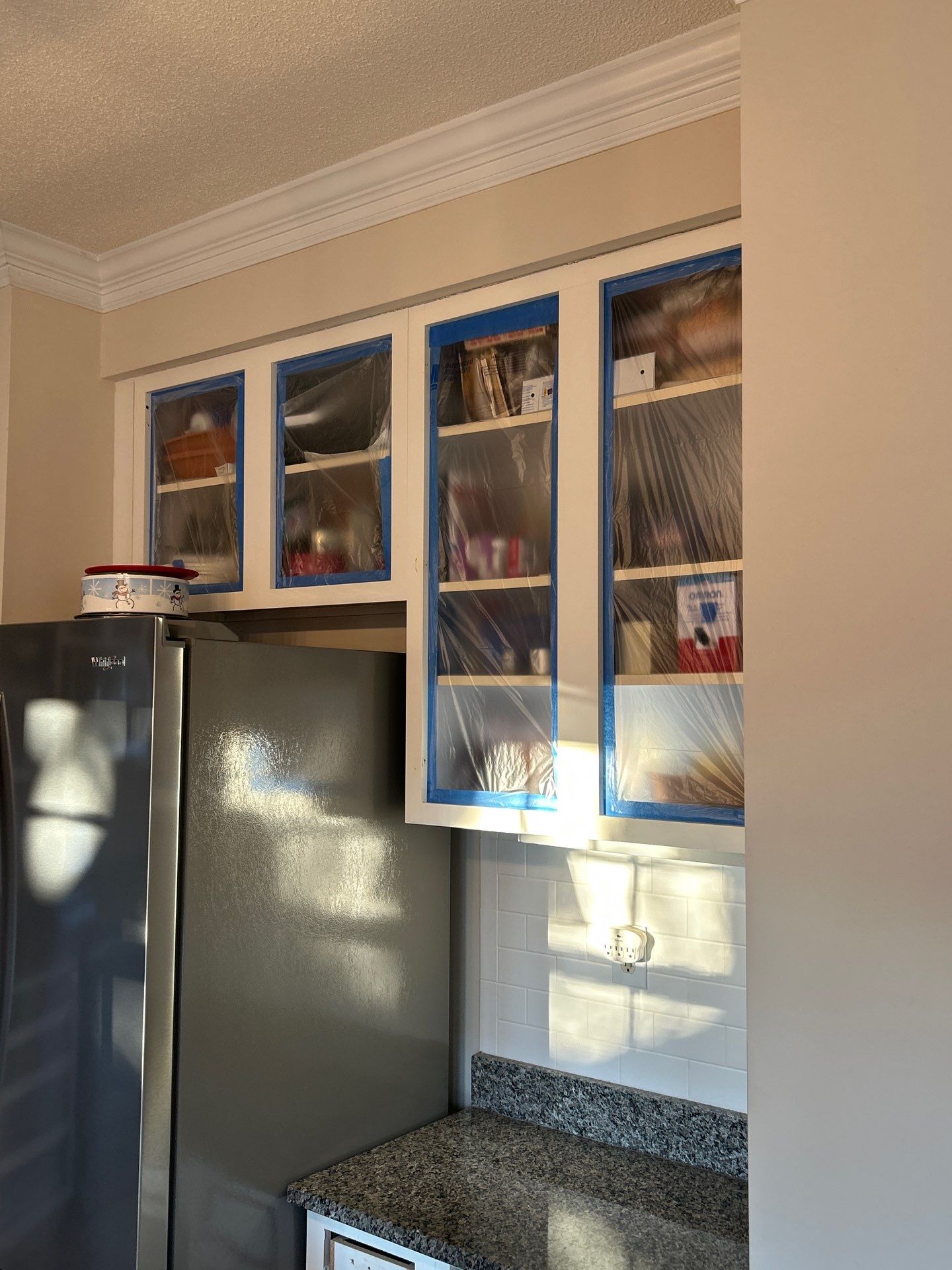 Cabinet painting by GonzalezPainters & Contractors Inc 