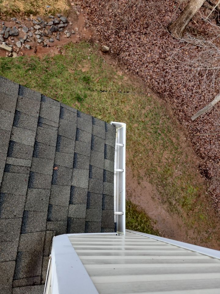 Gutter Cleaning using water by Power Wash Masters LLC