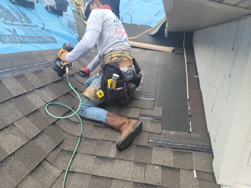 Residential Roofing Installation using Roof Replacement by American Roofing & Construction LLC