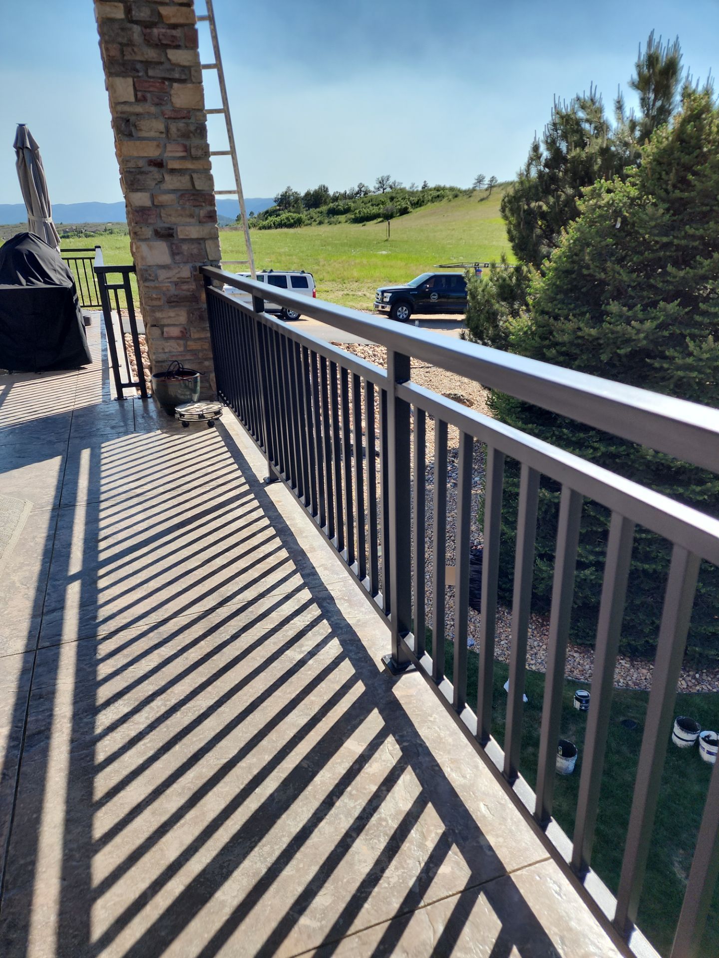 Castle Rock Elegance: White Stucco Exterior with Bold Tricorn Black by J&M Painting LLC