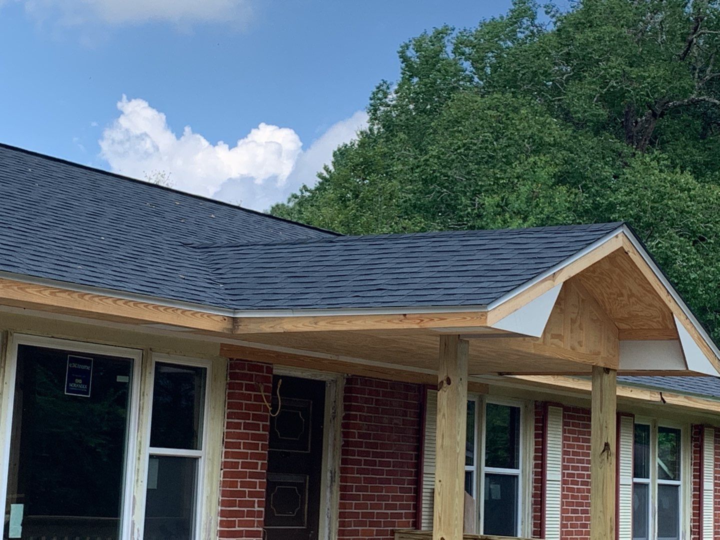 Residential Roofing Installation using Roof Replacement by American Roofing & Construction LLC
