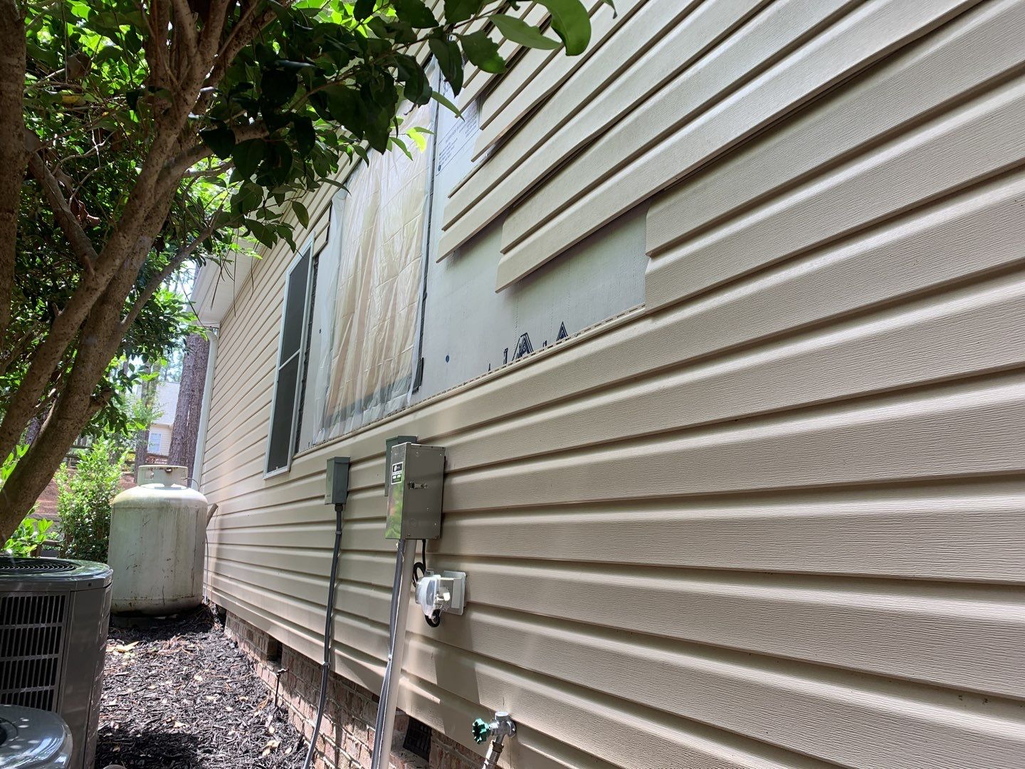 Siding Repair by American Roofing NC