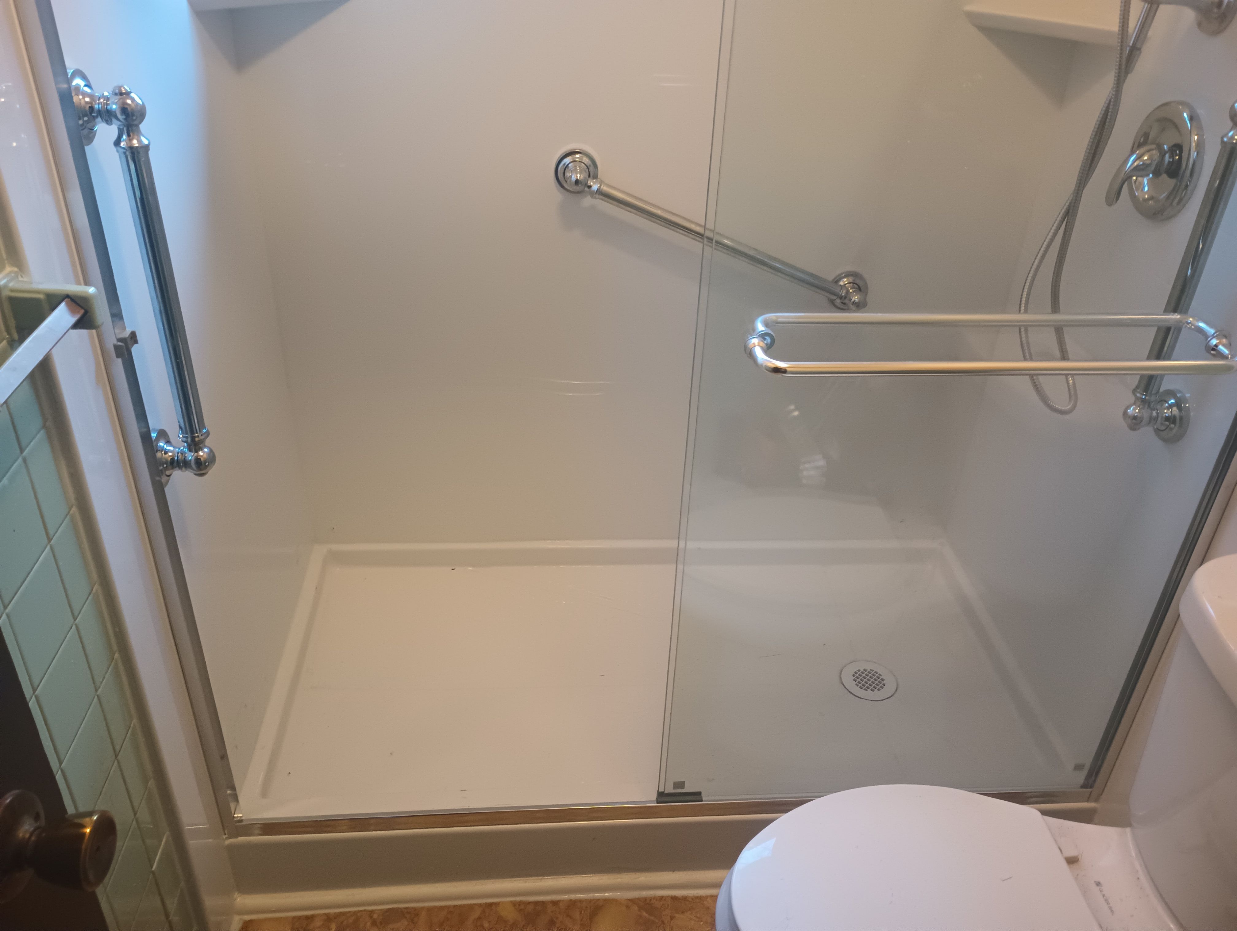 Tub to Shower Conversion using BCI Acrylic Shower System by Secure Construction Company Inc
