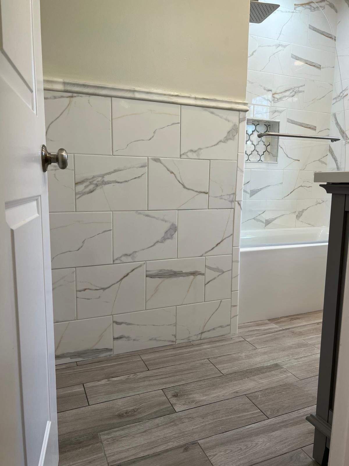 Bathroom Remodel using Tile by Home Concepts Construction