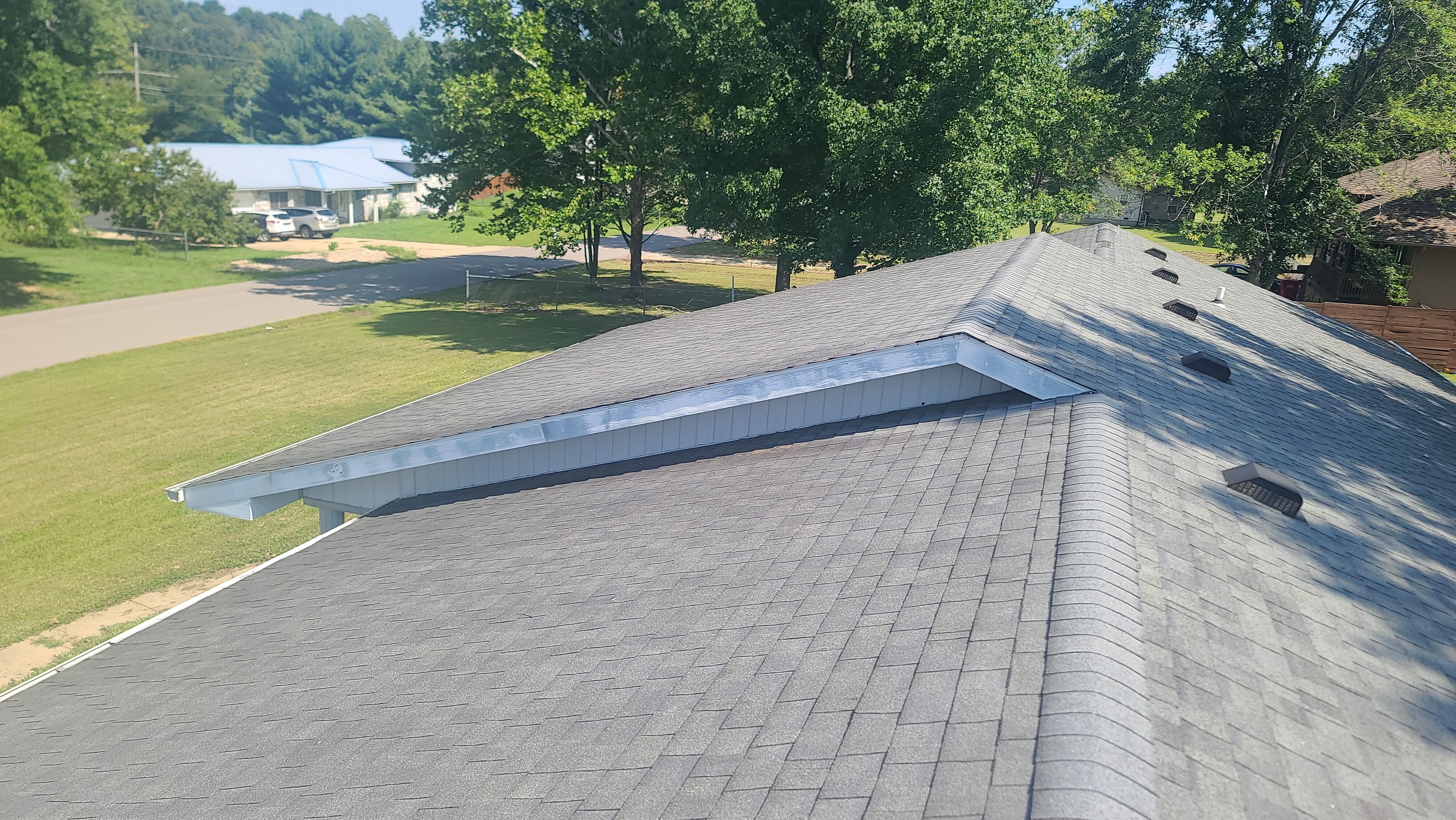 Residential Roofing & Downspouts Install  by Titan Commercial & Residential Roofing 