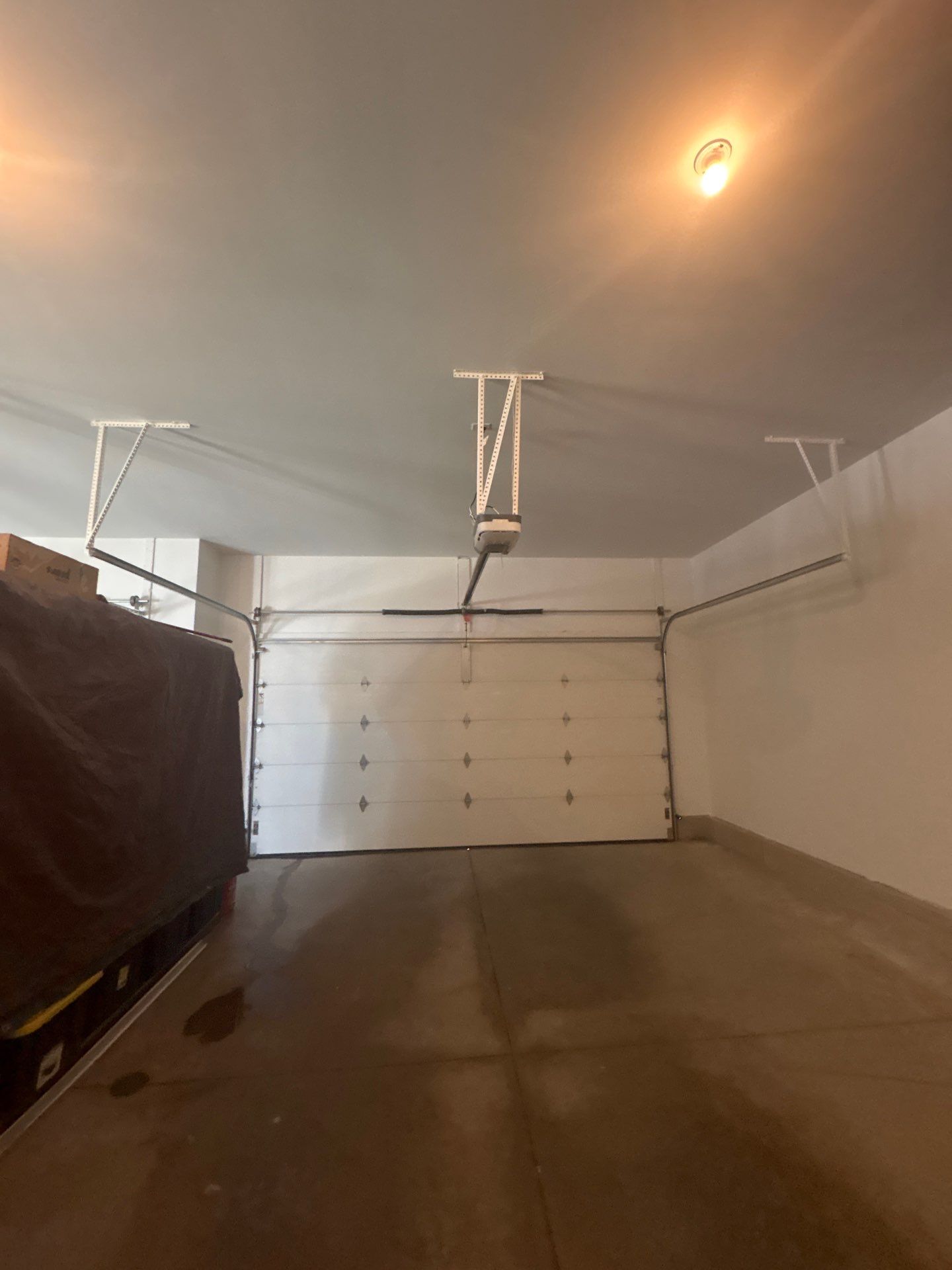 Full Garage Interior Drywall Finishing and Priming in Sioux Falls by Select Painting, Coatings & Garage Cabinets