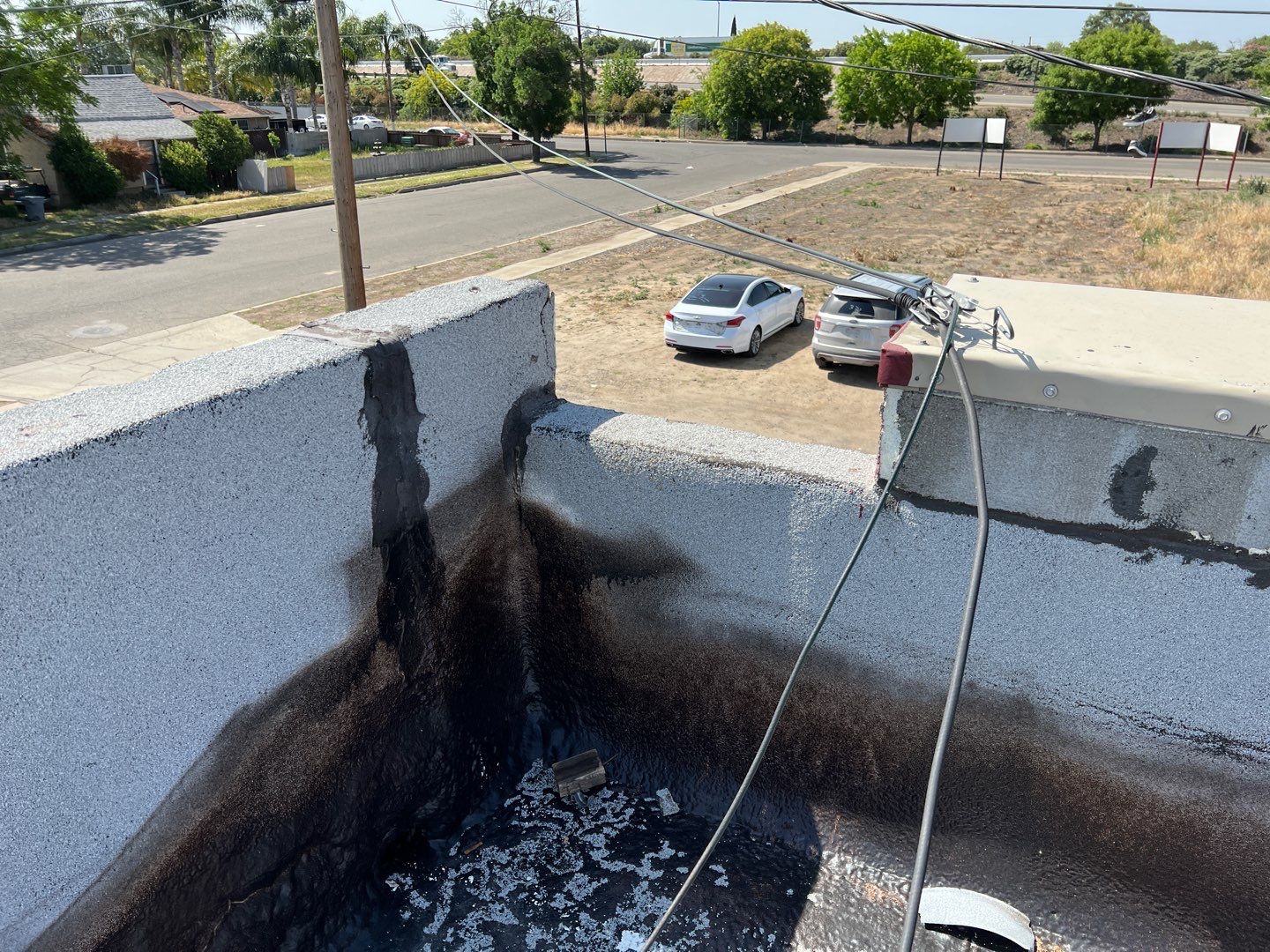 Spray foam and coatings using Conklin Benchmark/PUMA XL coatings and spray foam by Straight Edge Roofing Inc