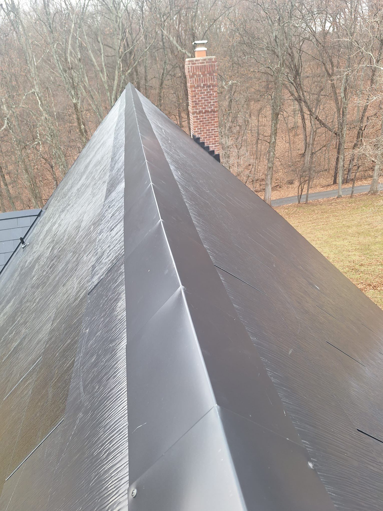 Tesla Solar Roof  using Tesla Powerwall by American Home Contractors