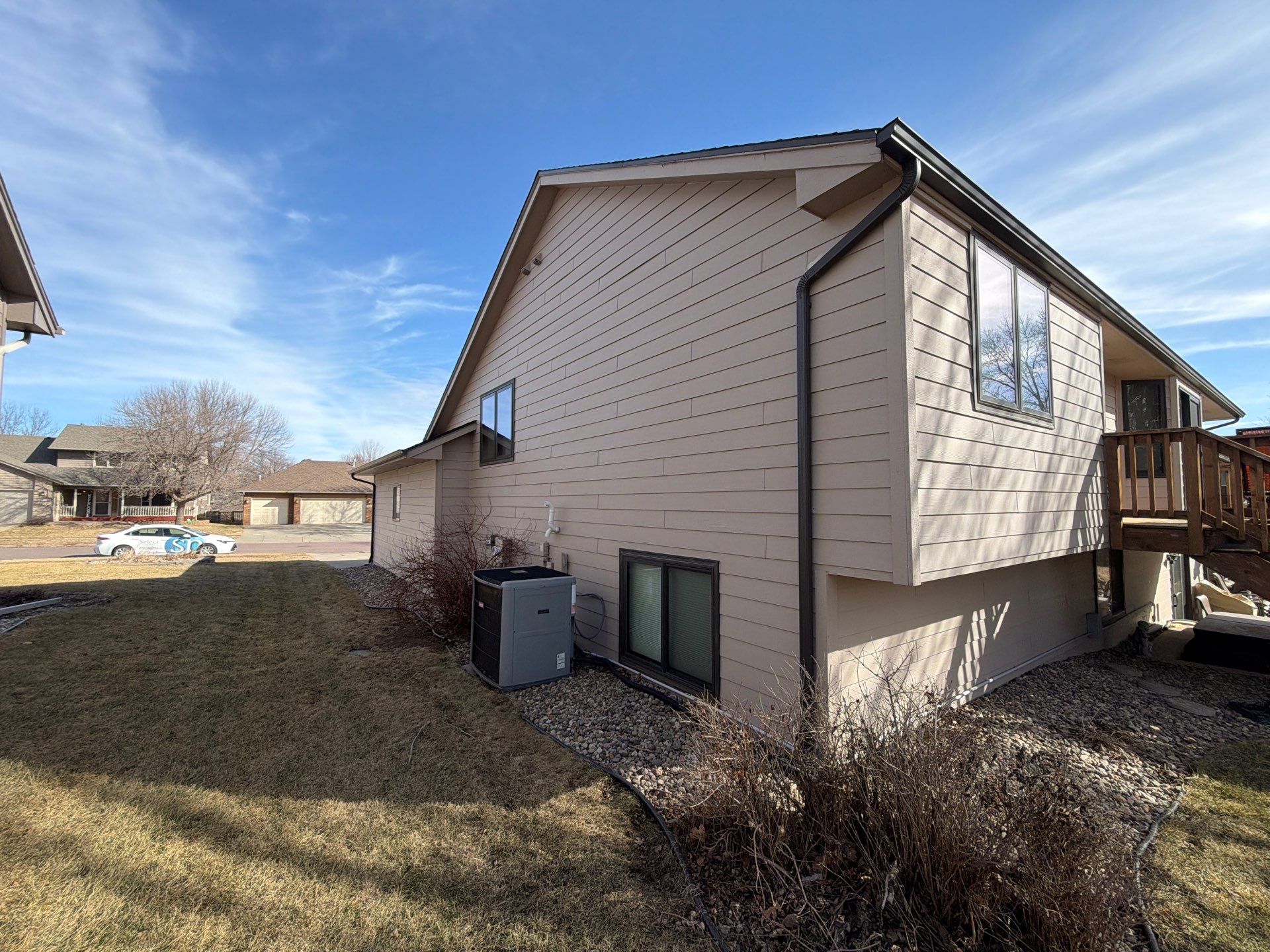 Residential Exterior Painting and Trim Restoration in Sioux Falls by Select Painting, Coatings & Garage Cabinets
