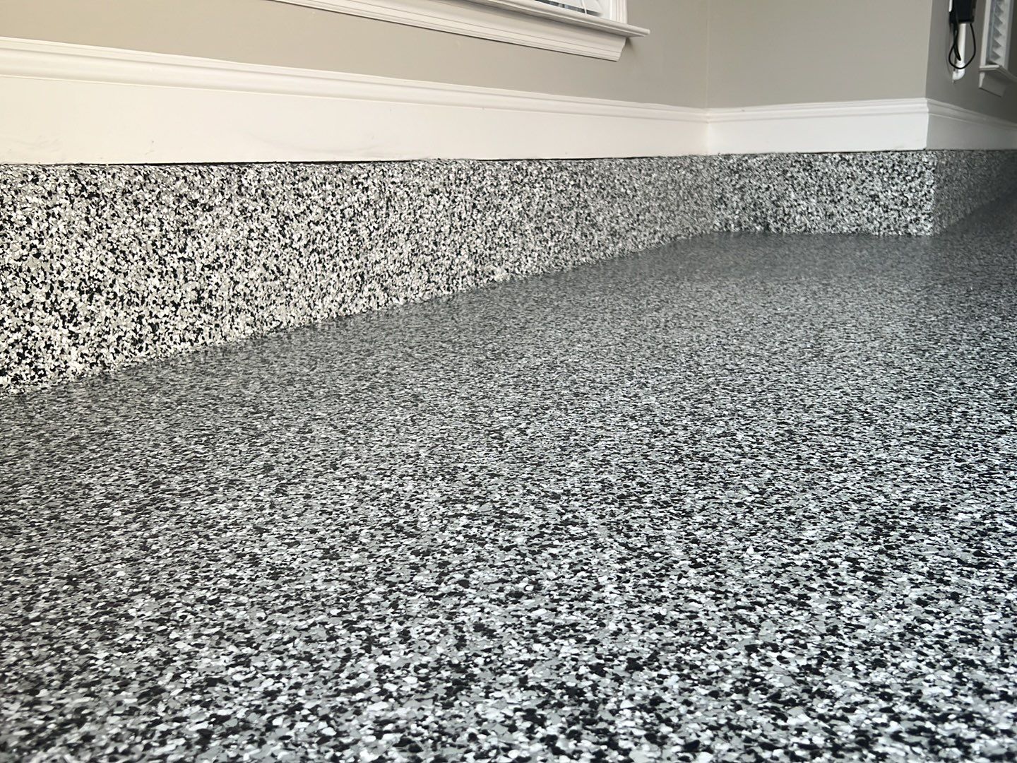 Domino Does It!  by Deese Elite Concrete Coatings
