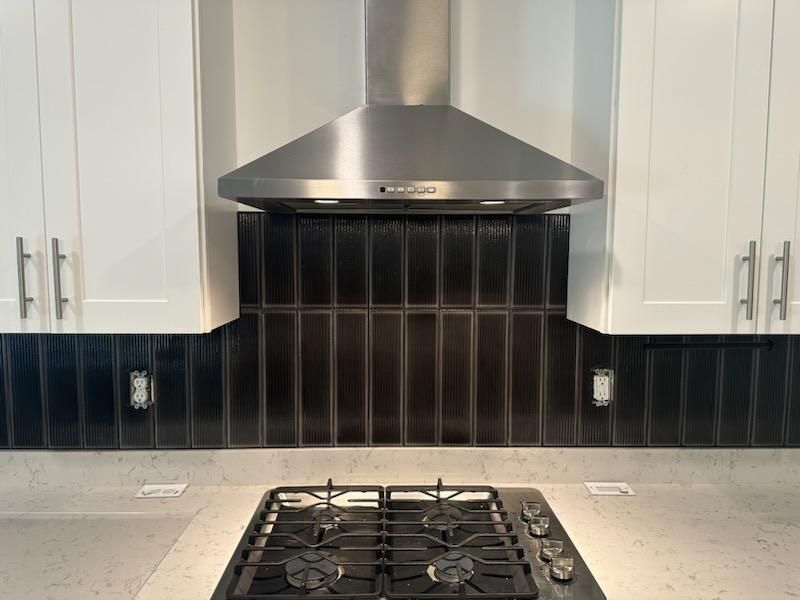 New build Kitchen Backsplash by Footprints Floors Morristown