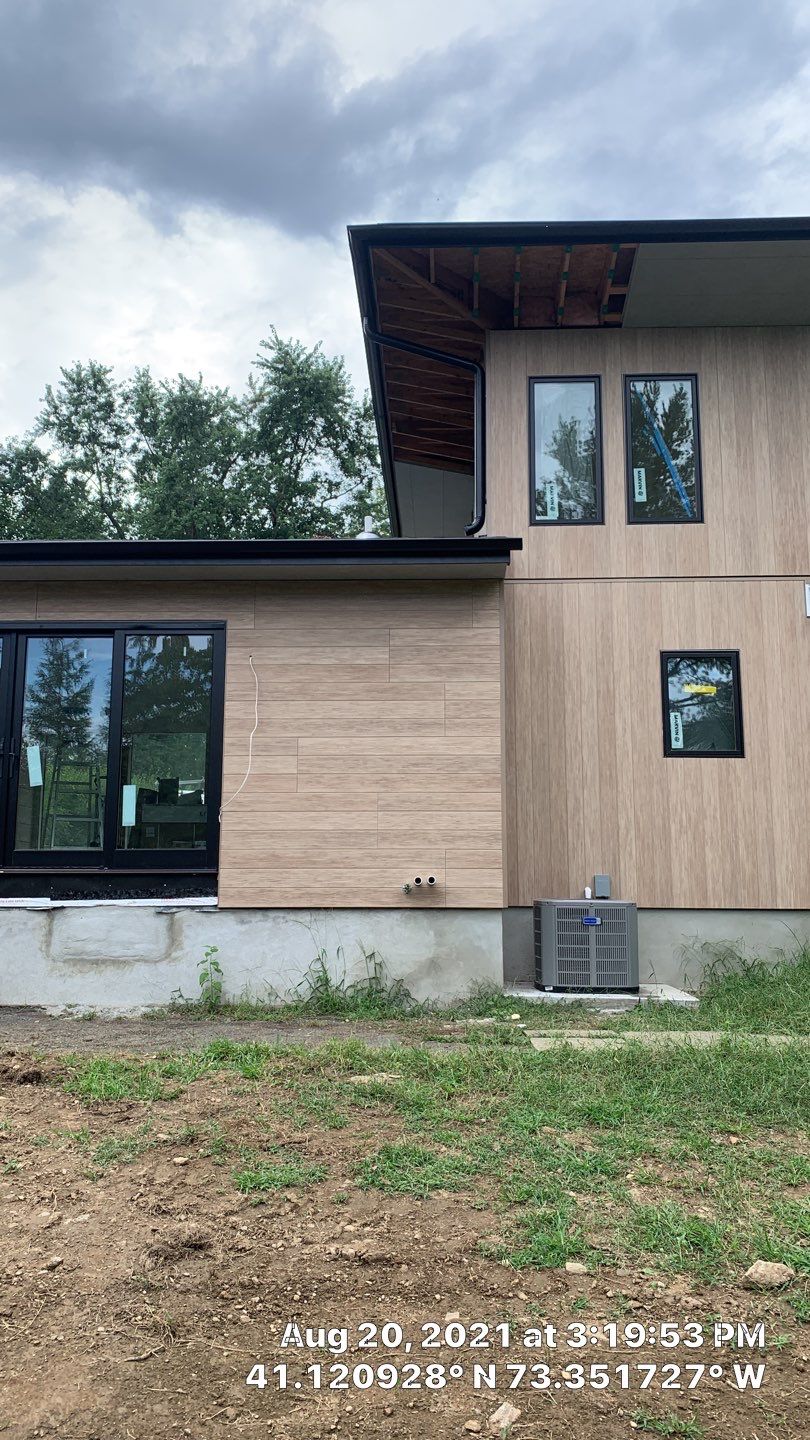 Black Gutters in wesport by A Plus Exterior