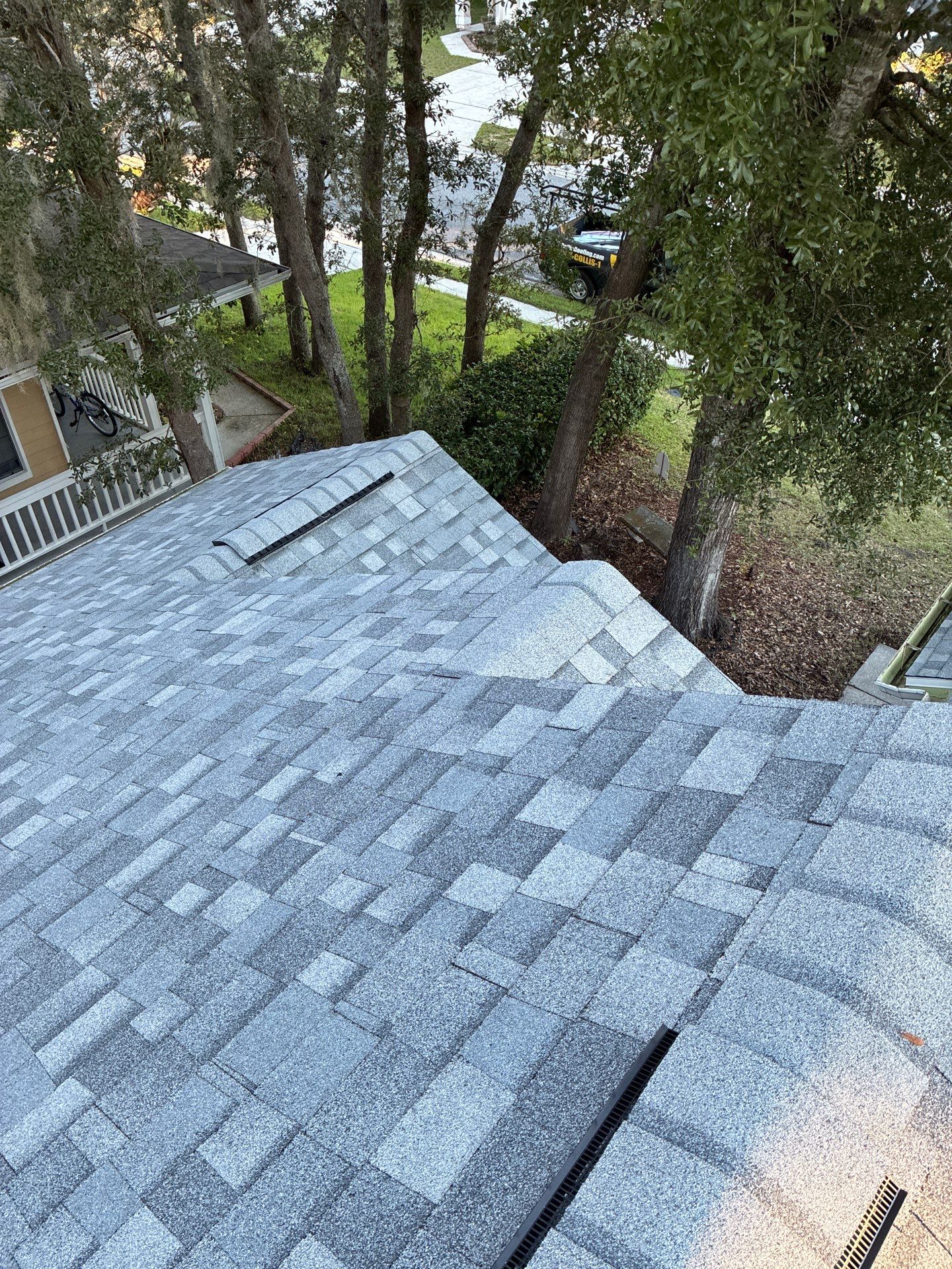 Antique Silver Shingle Roof Replacement by Collis Roofing Inc.