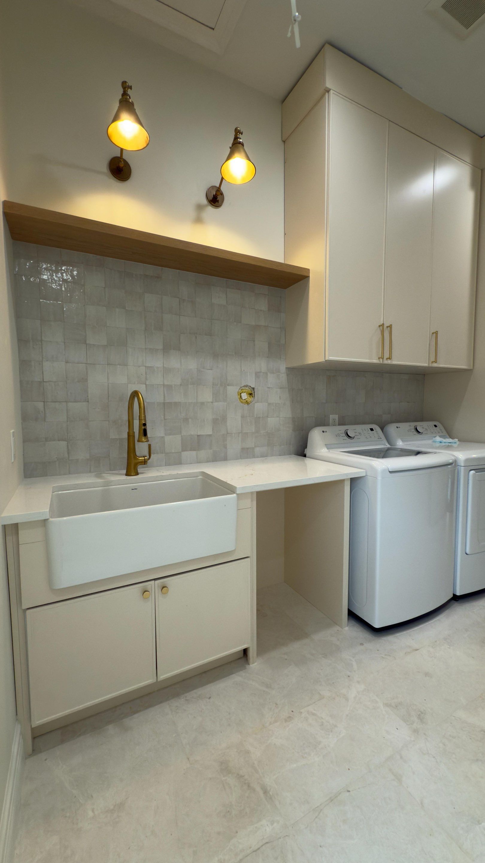 Laundry Room accent wall in Boca Raton by Broward Tile Guys